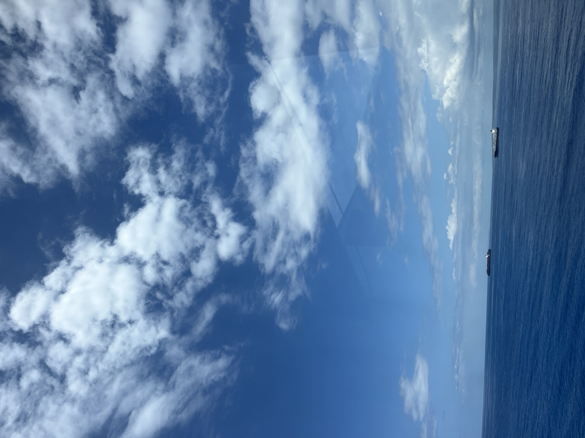 Two cargo ships spotted on calm ocean waters