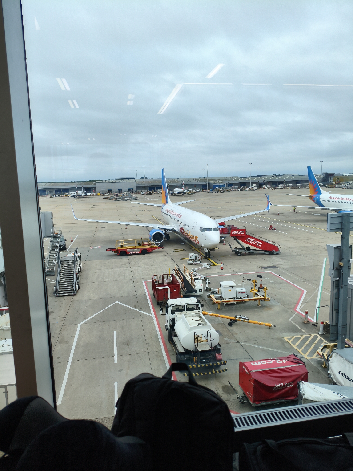 Two Jet2 planes sit on the tarmac at Stansted Airport