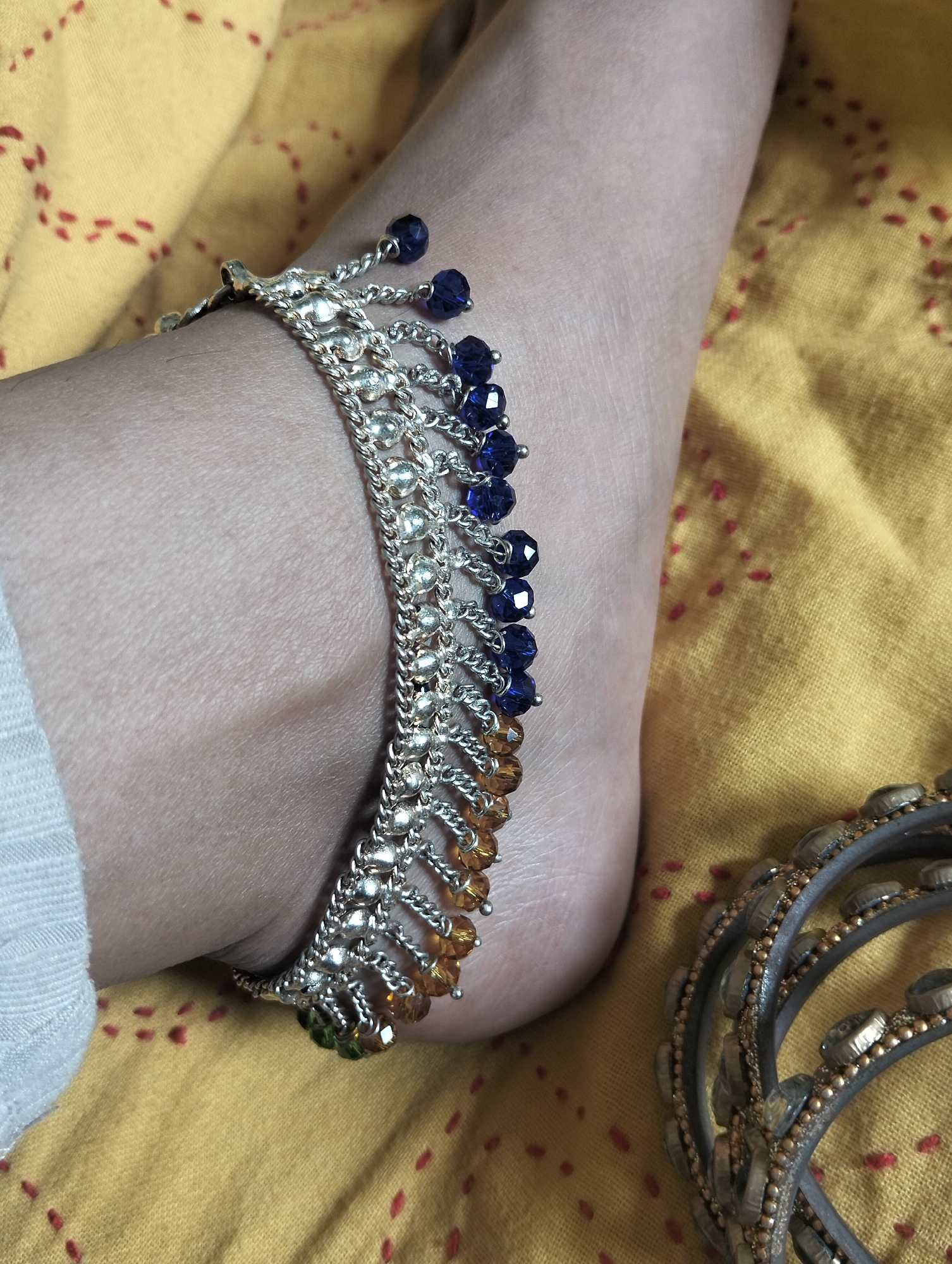 Traditional jewelry displayed on fabric in Dhaka, Bangladesh