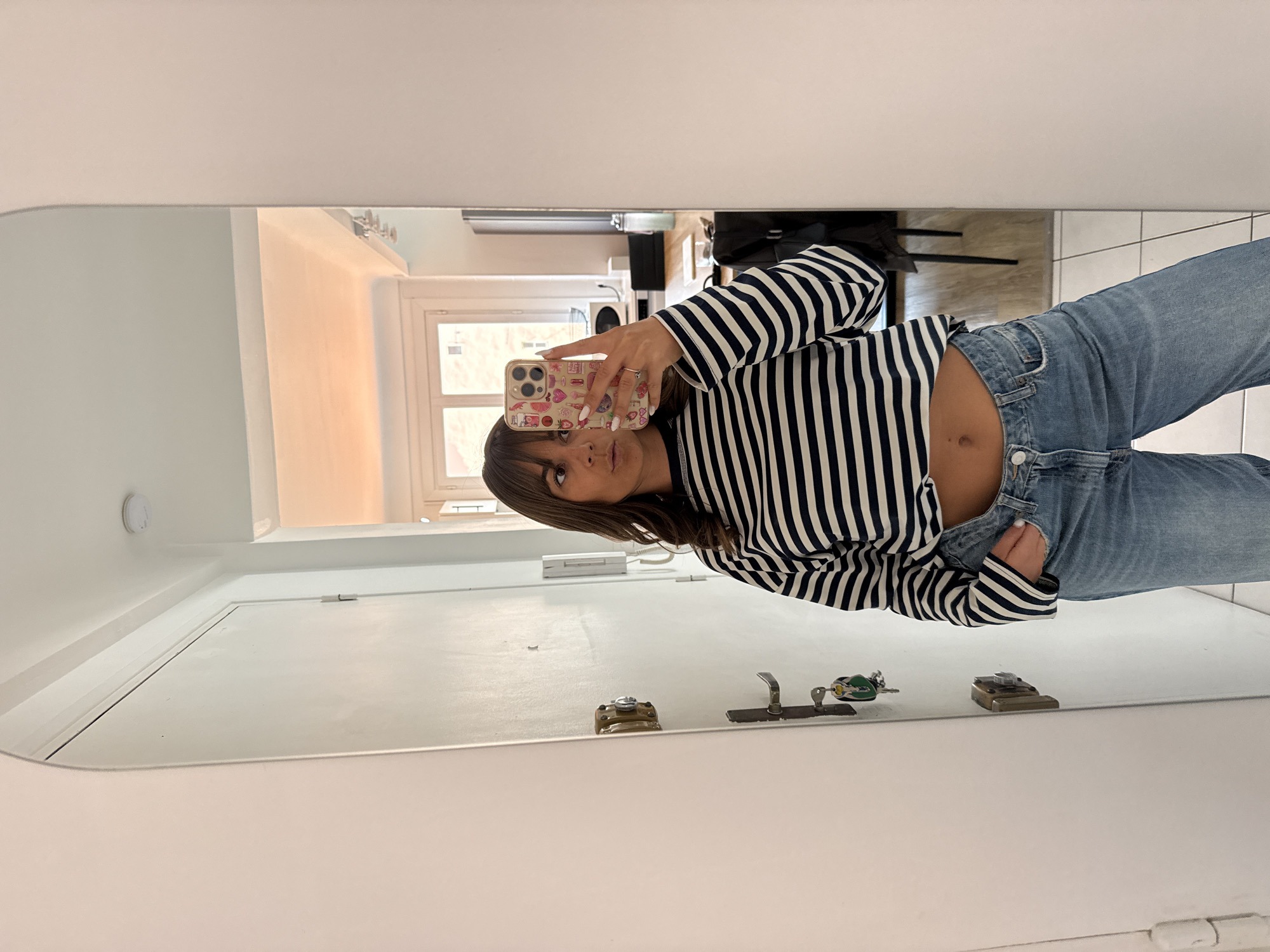Woman takes selfies, works on laptop in Cannes