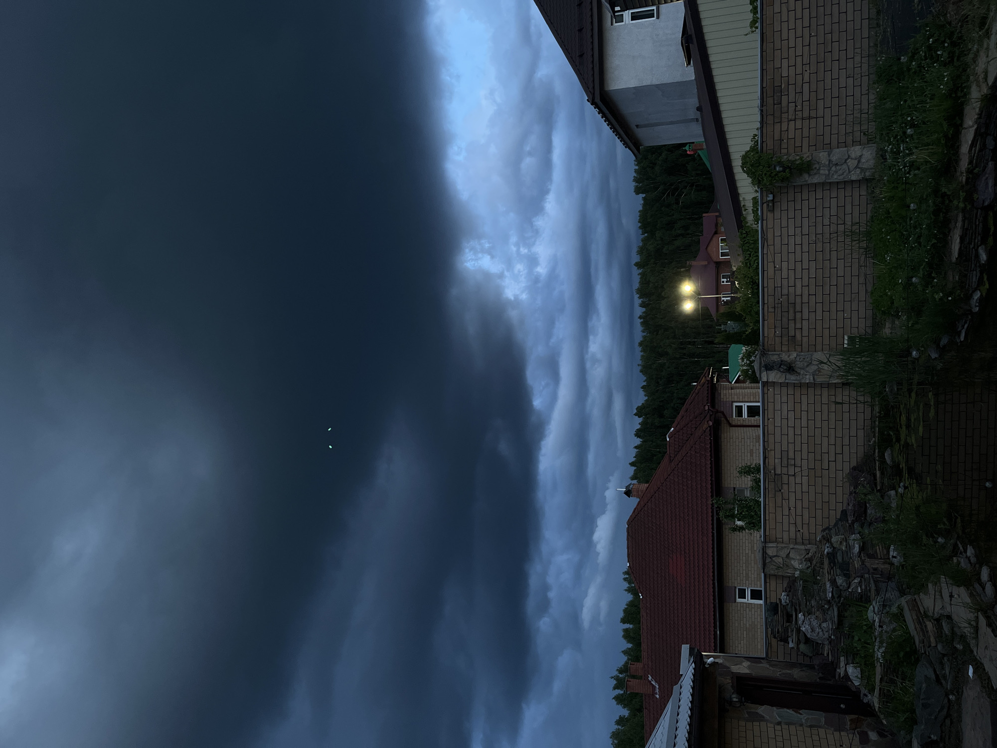 Storm clouds gather over Orekhova, Russia at dusk