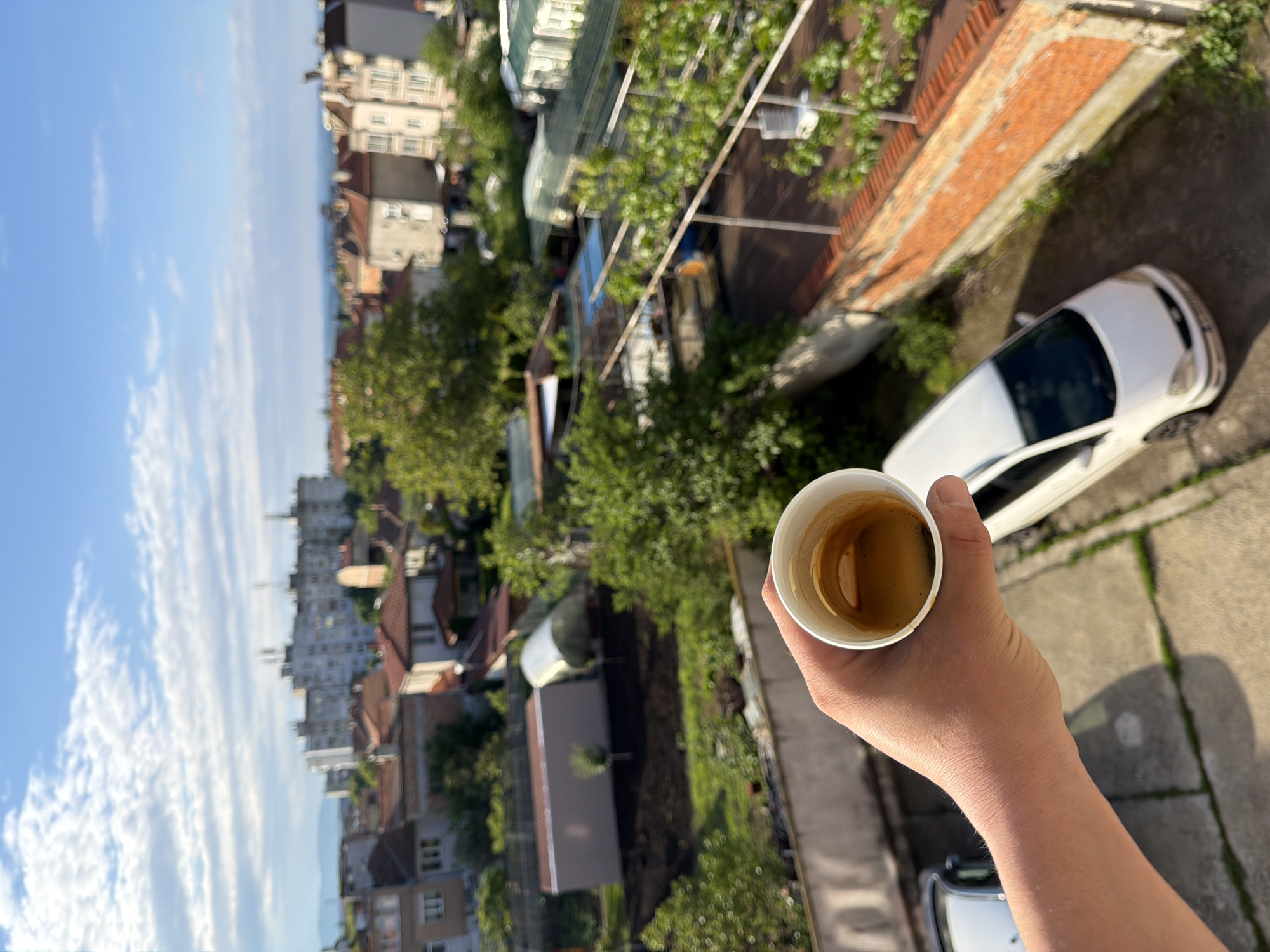 Morning coffee moment overlooking Burgas cityscape