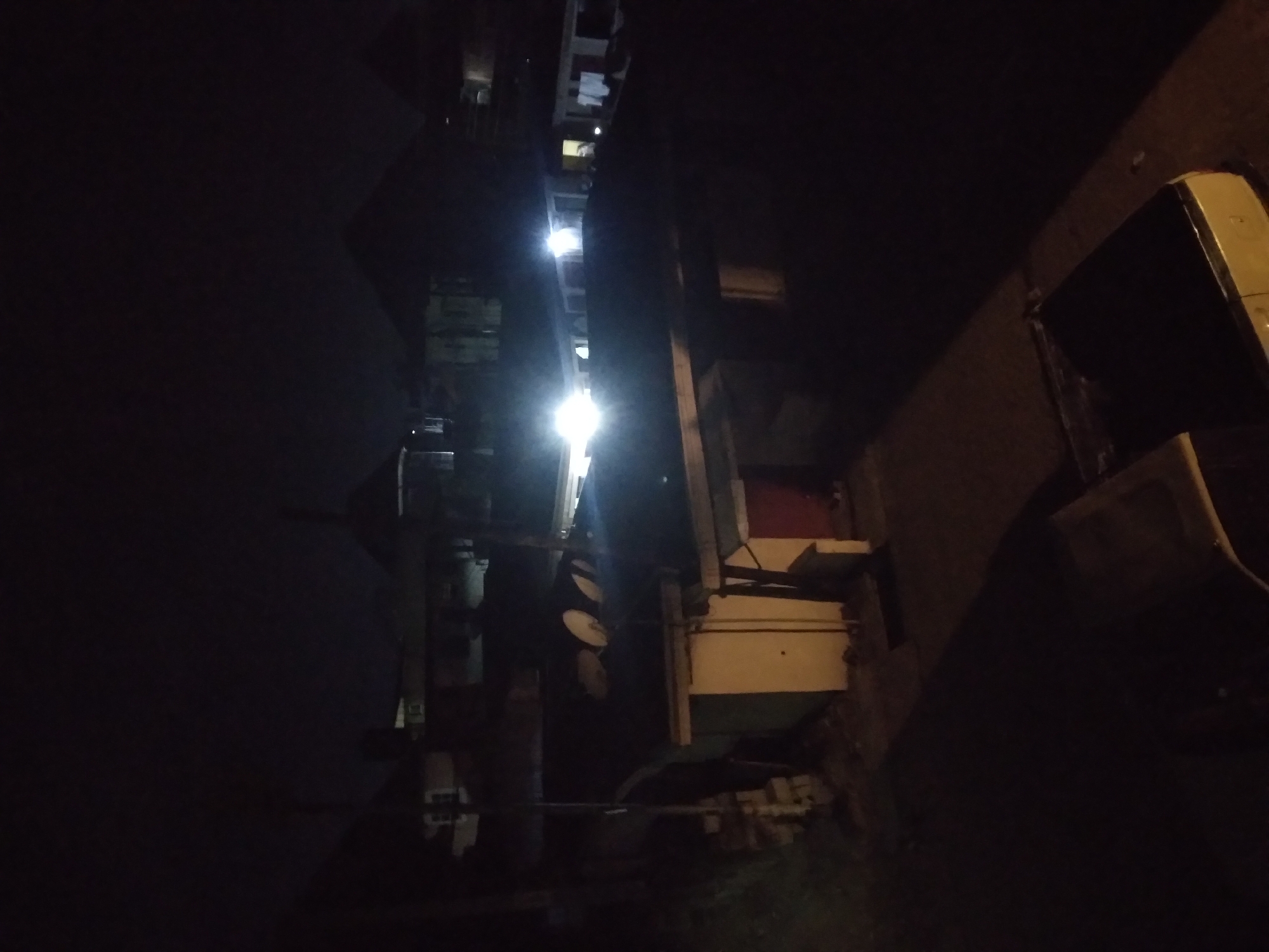 Nighttime alleyway documented in Onitsha, Nigeria