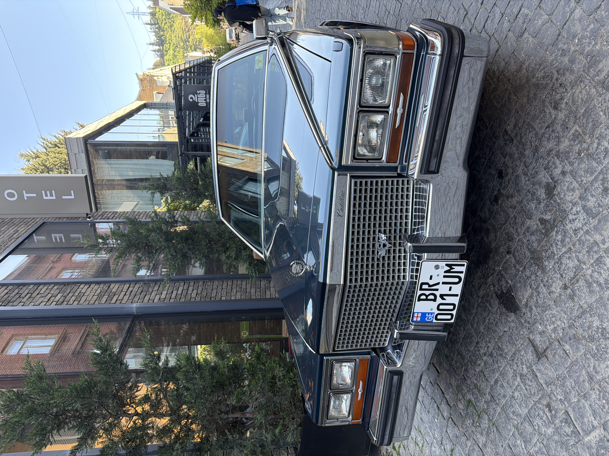 Blue Cadillac spotted near Saint George statue in Tbilisi