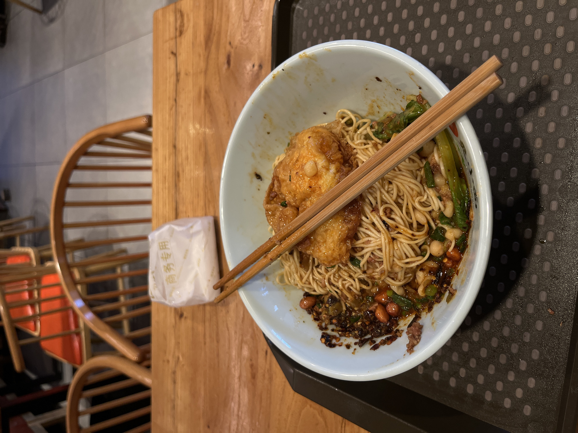 Noodle meal documented at Chongqing restaurant during lunch hour