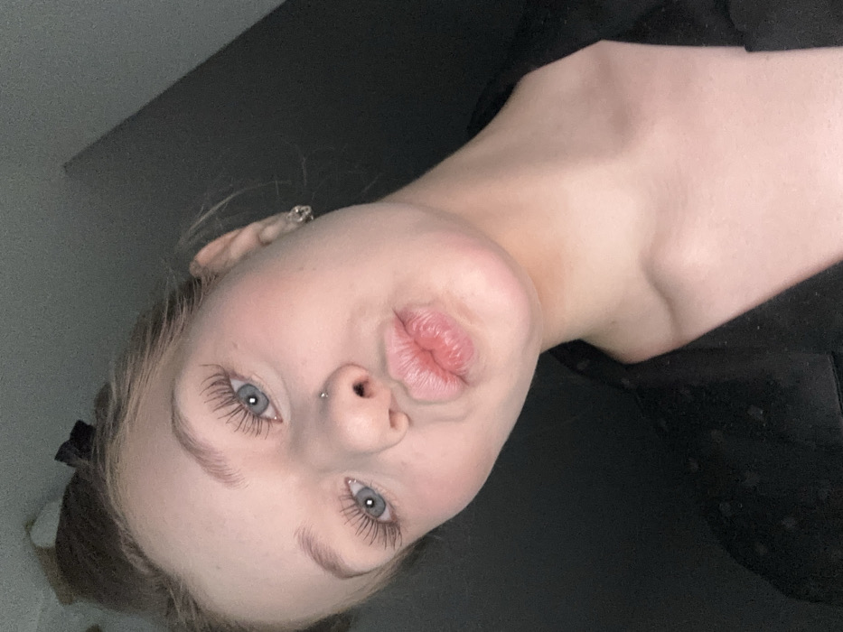 Woman takes selfies in Yekaterinburg early morning