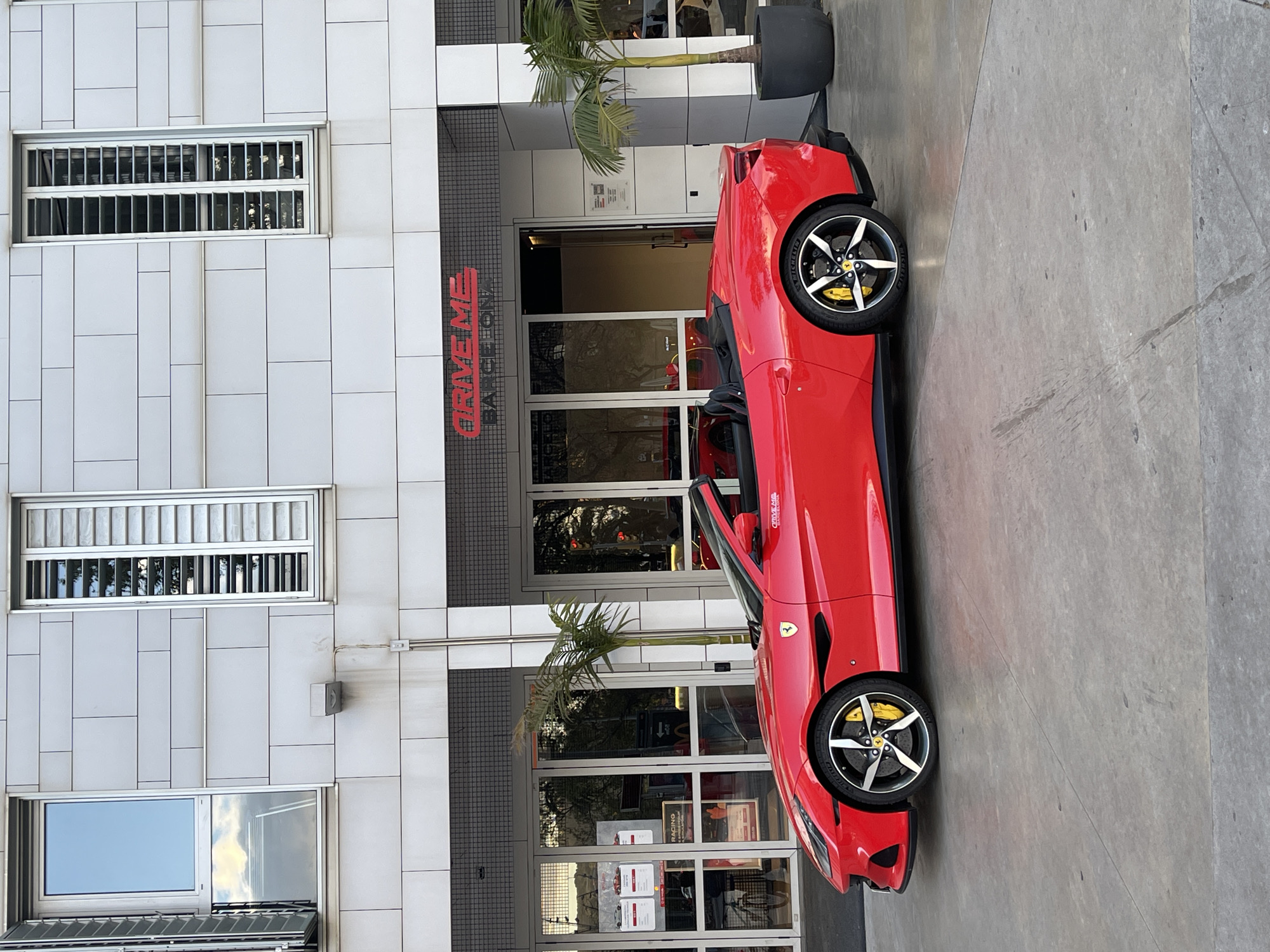 Street runners, Ferrari, motorcycle spotted in Barcelona intersection