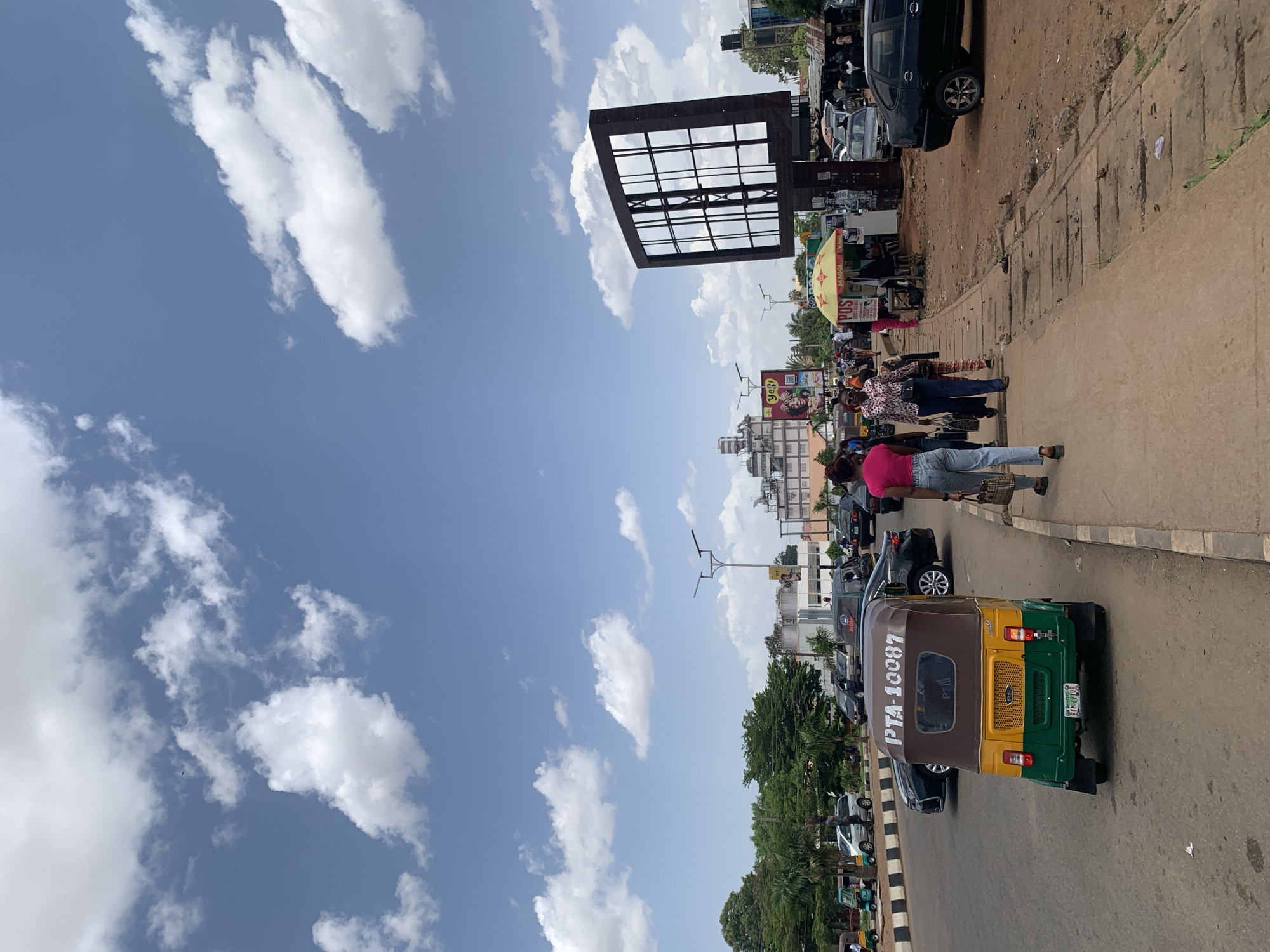 Midday street life documented across Jos, Nigeria commercial districts