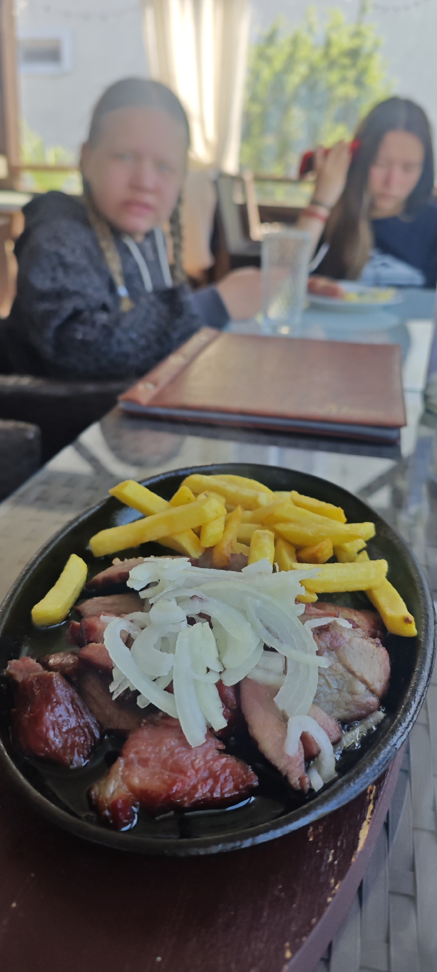 Morning diners enjoy sizzling meat dishes at Ldzaa restaurant