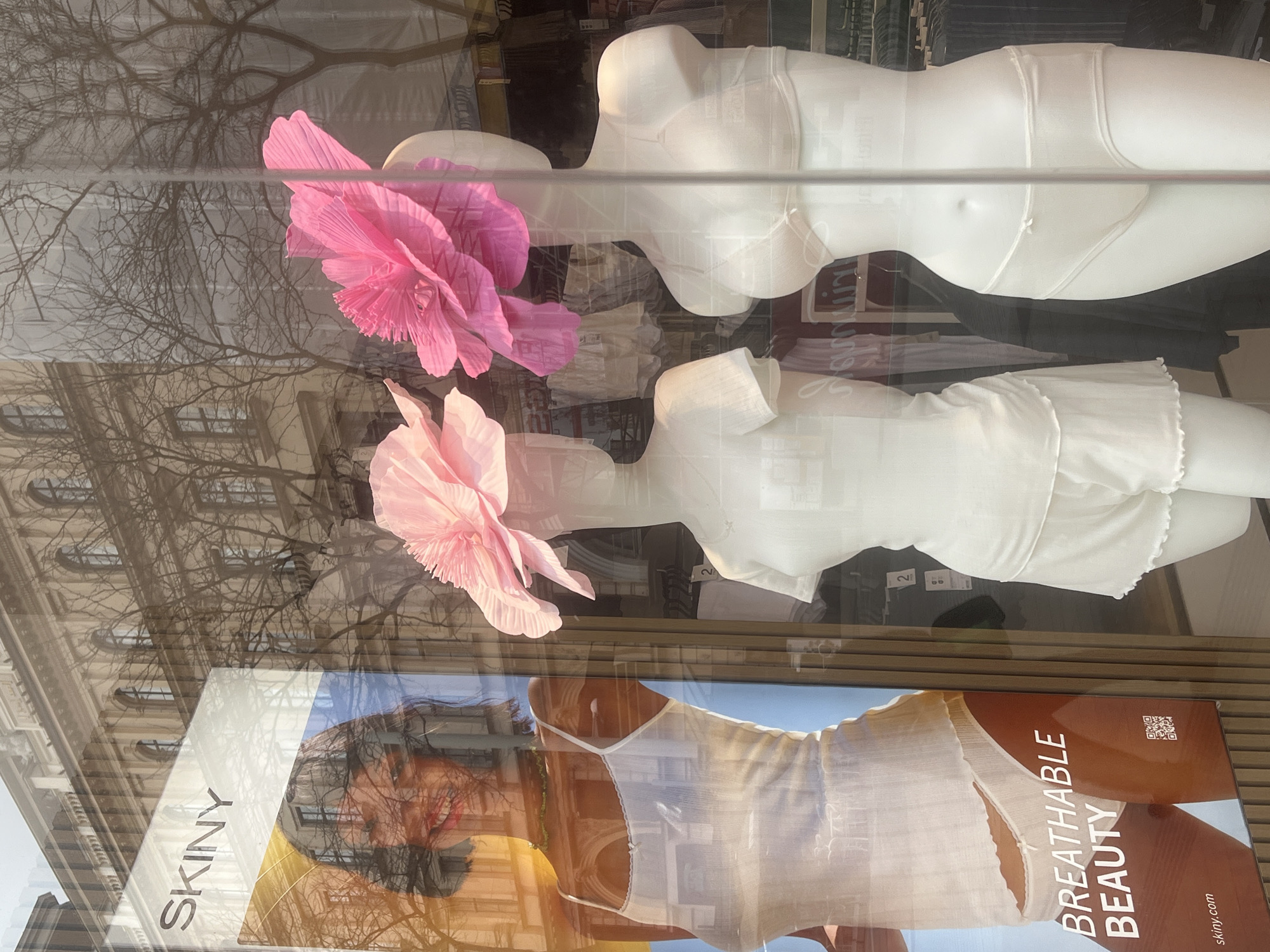 Vienna store displays mannequins with pink paper flower decorations