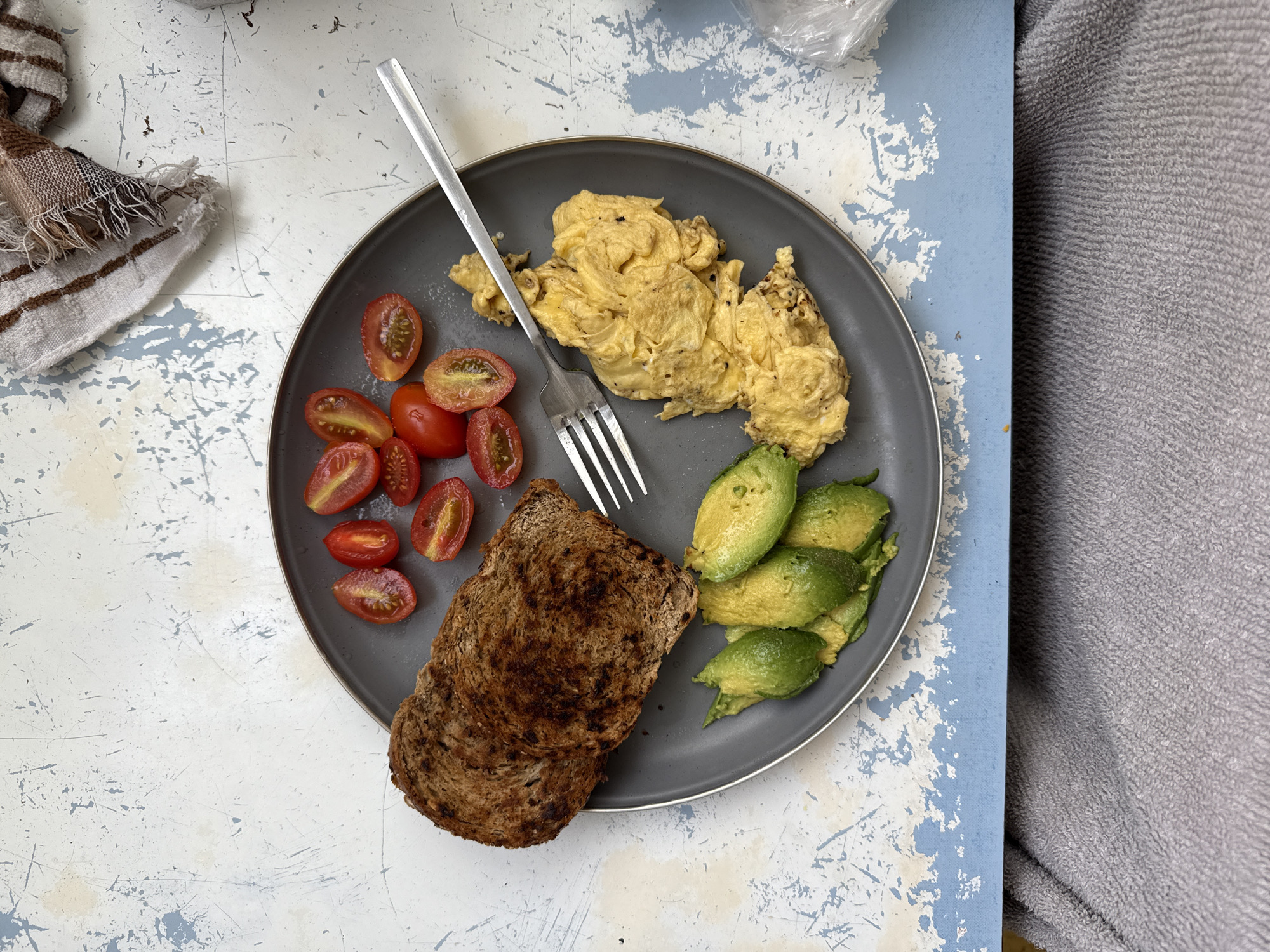 Breakfast plate documented in Buenos Aires featuring eggs and avocado
