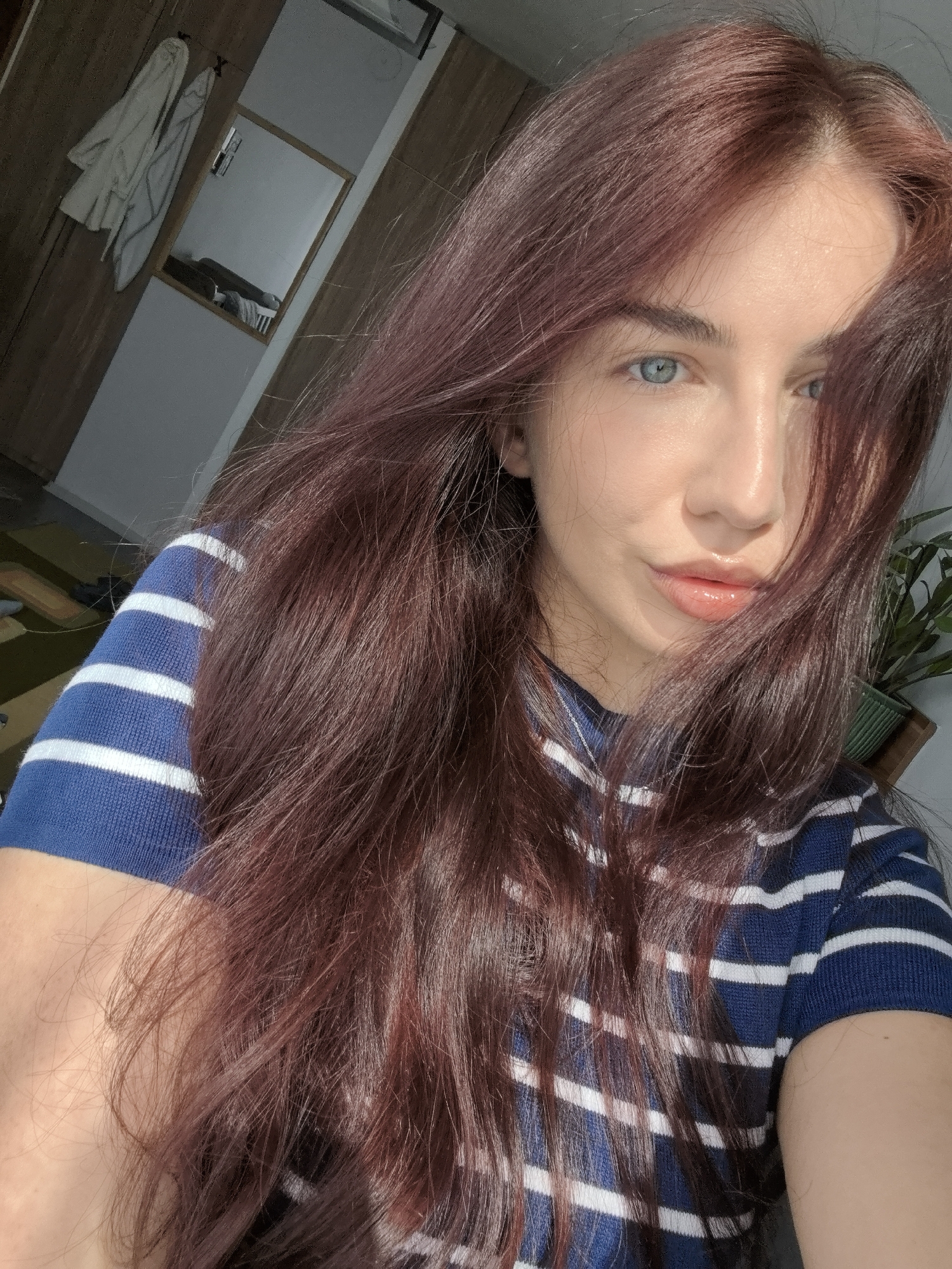 Young woman takes selfies in Stara Zagora bedroom