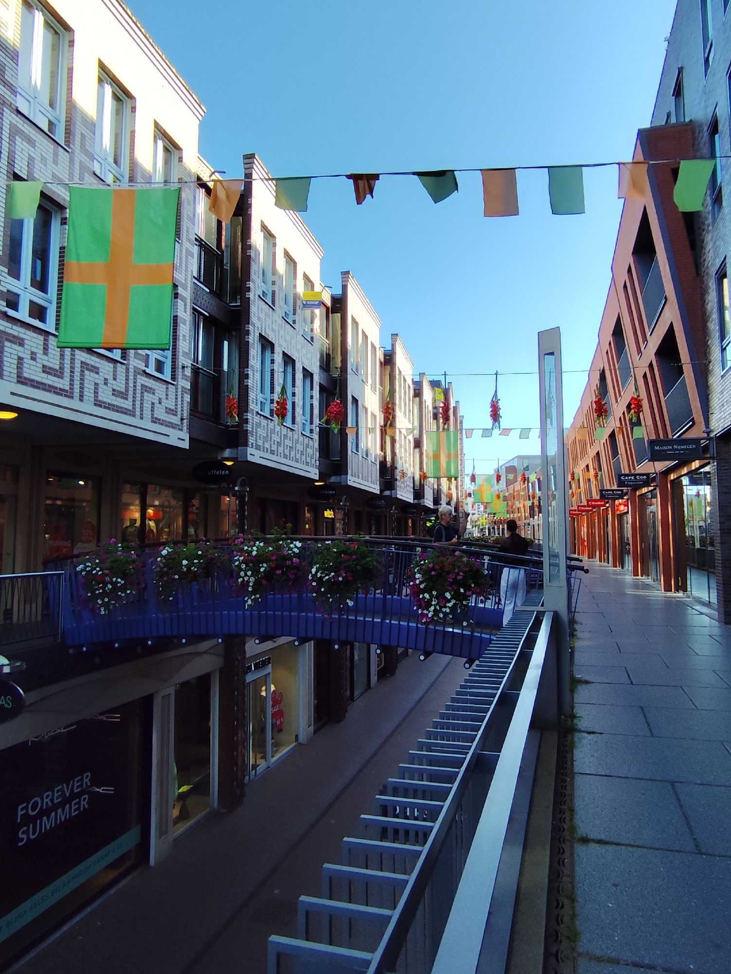 Nijmegen streets decorated and busy on a summer morning