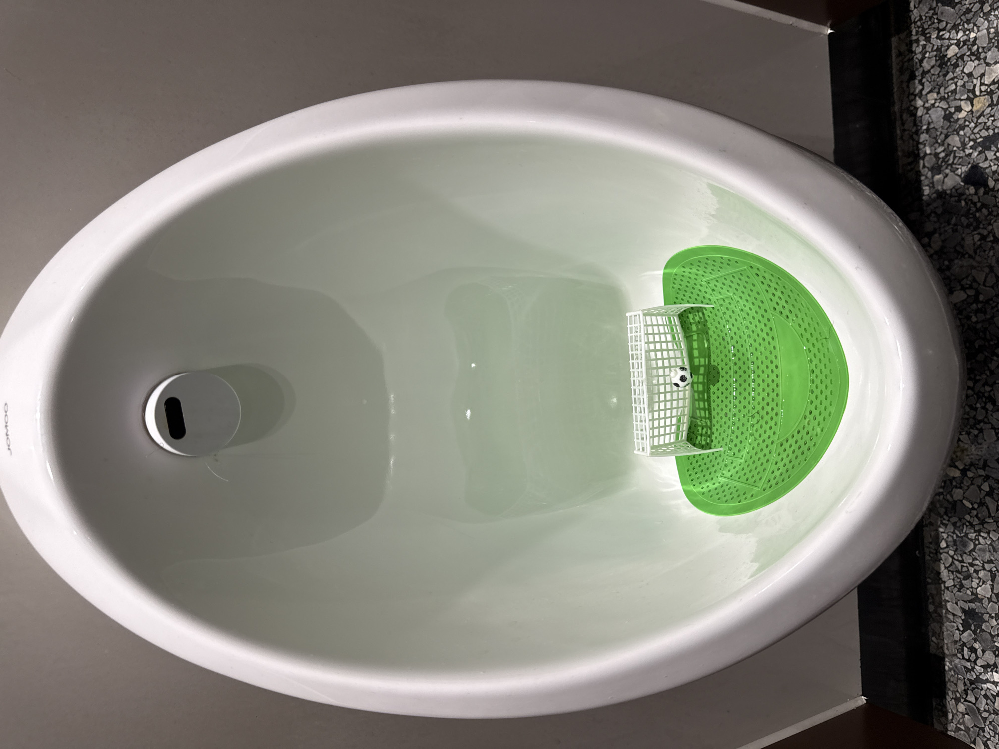 Soccer goal urinal screen spotted in Beijing restroom
