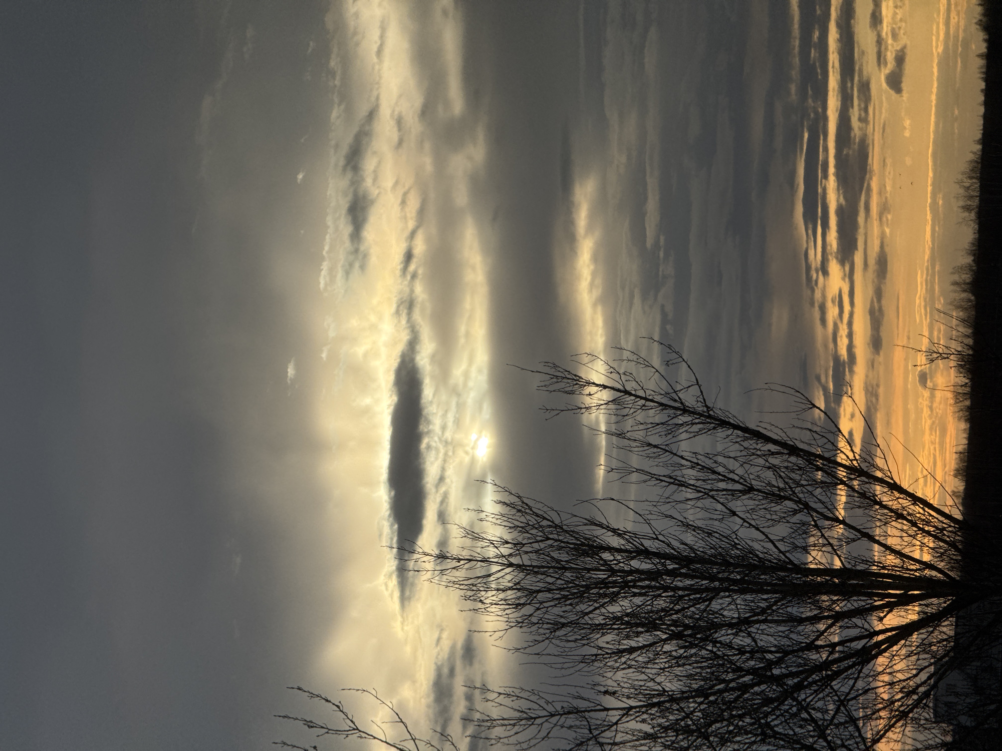 Dramatic sunrise or sunset sky captured with silhouetted landscape