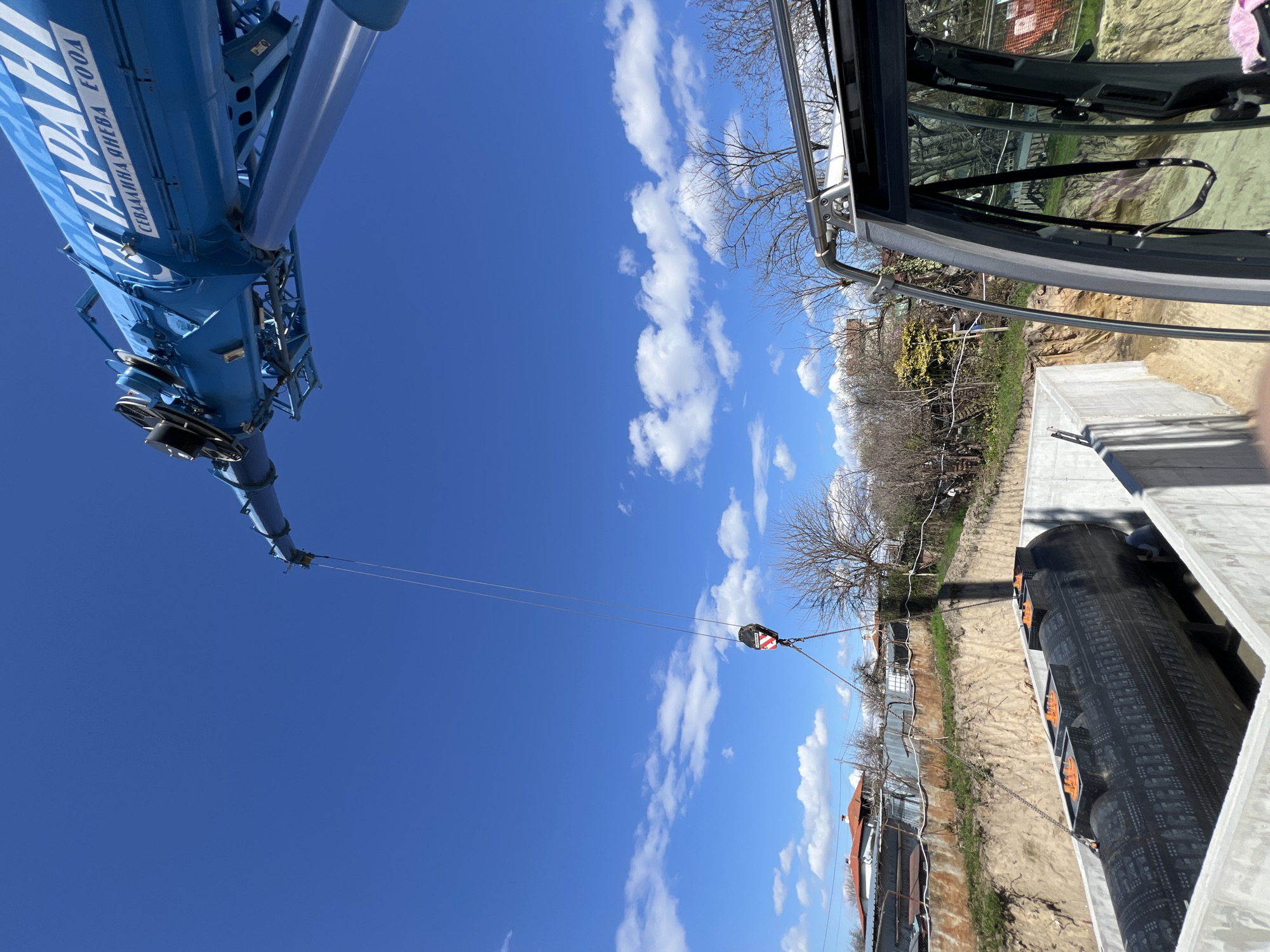 Crane lifts pipe section in Priseltsi infrastructure work