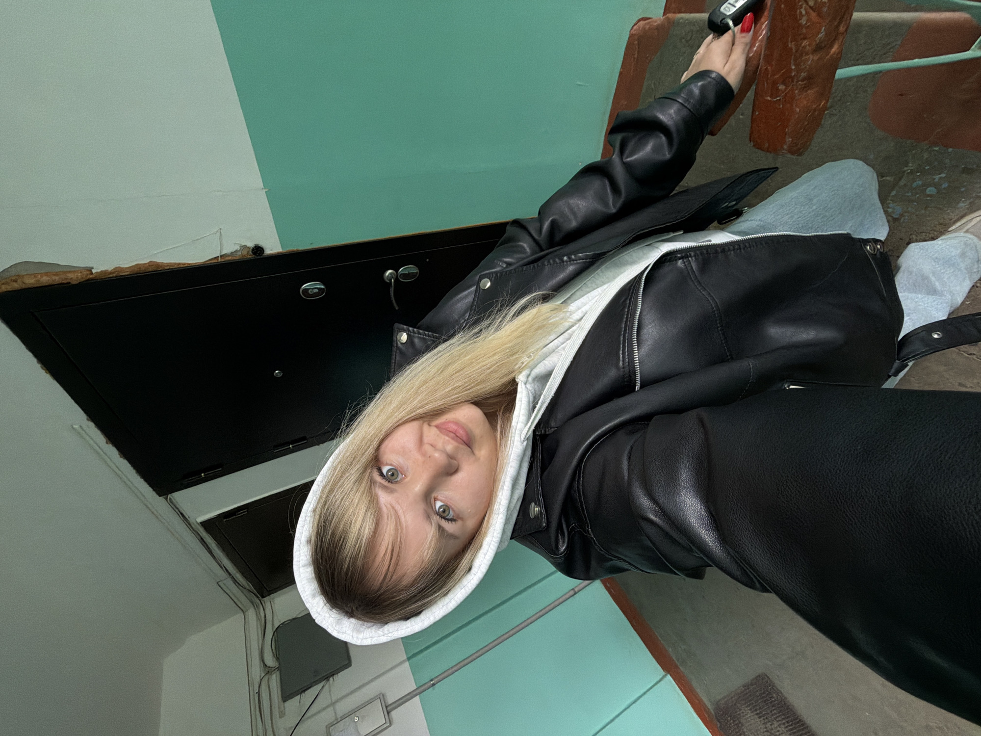 Woman photographed in building locations in Chaikovsky, Russia