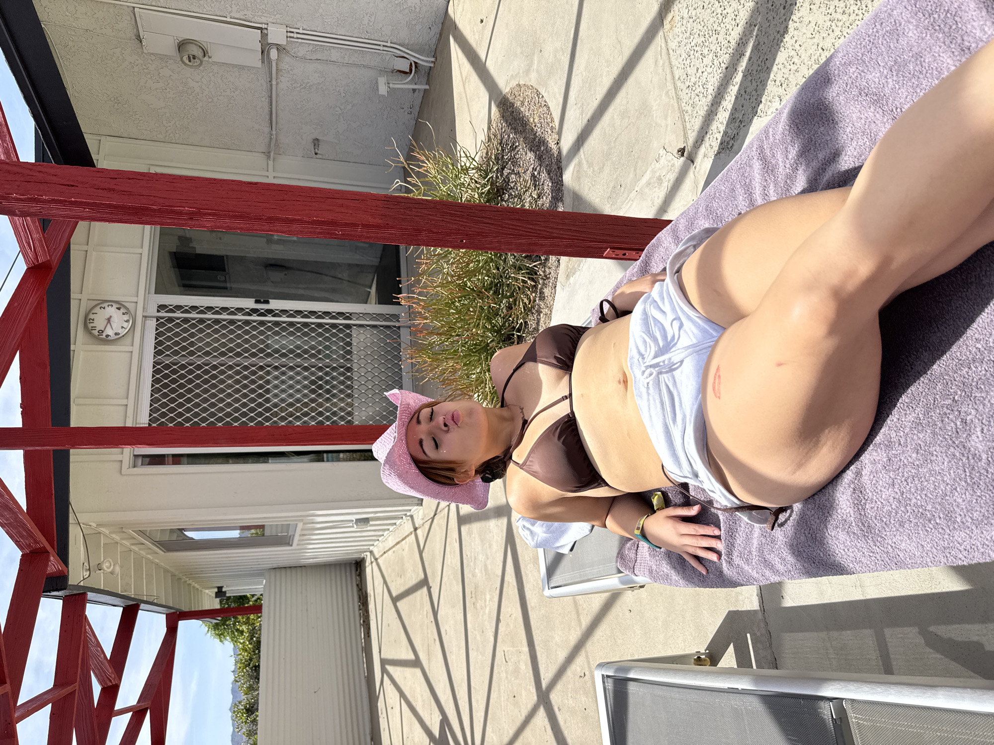 Woman sunbathes, swims at Yucca Valley residence