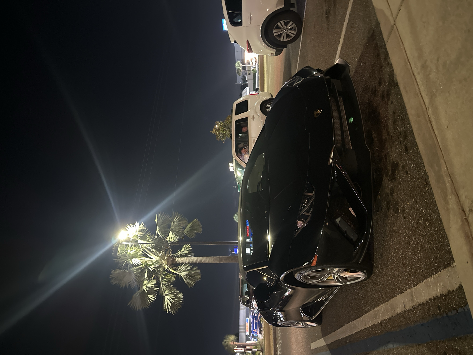 Black Lamborghini spotted parked on Tampa street at night