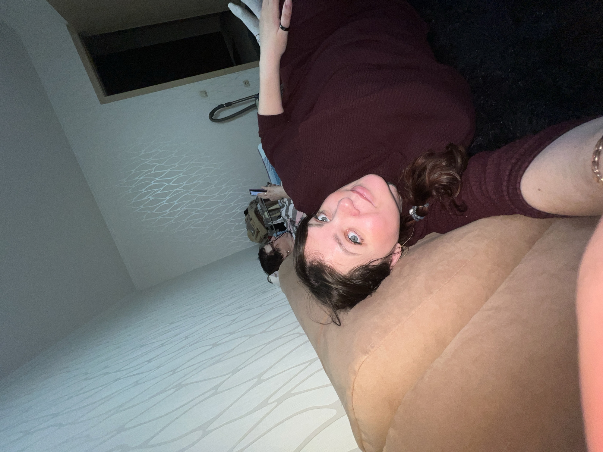 Women photograph casual indoor moments in Perm home