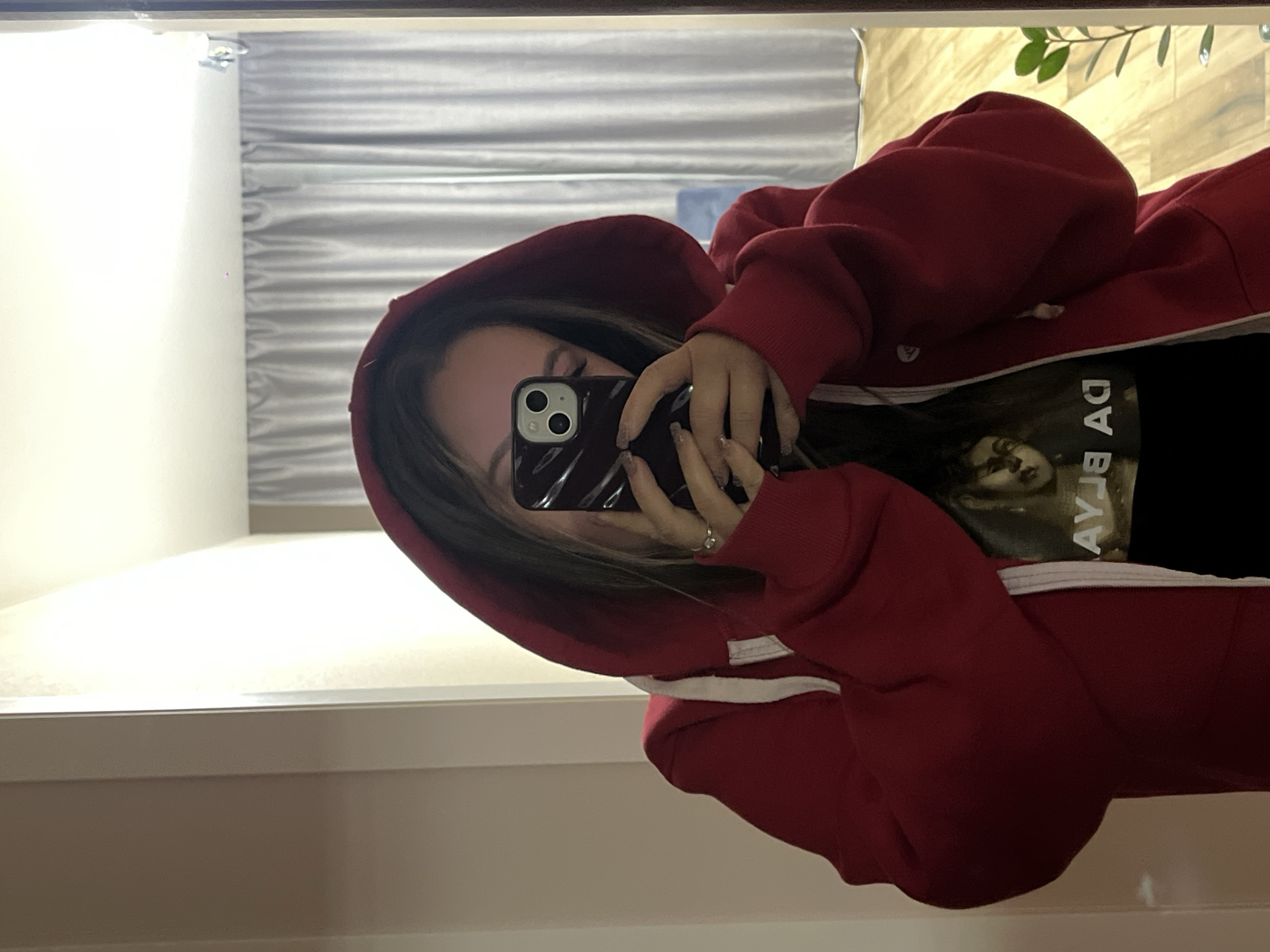 Woman takes mirror selfie in Krasnodar, Russia