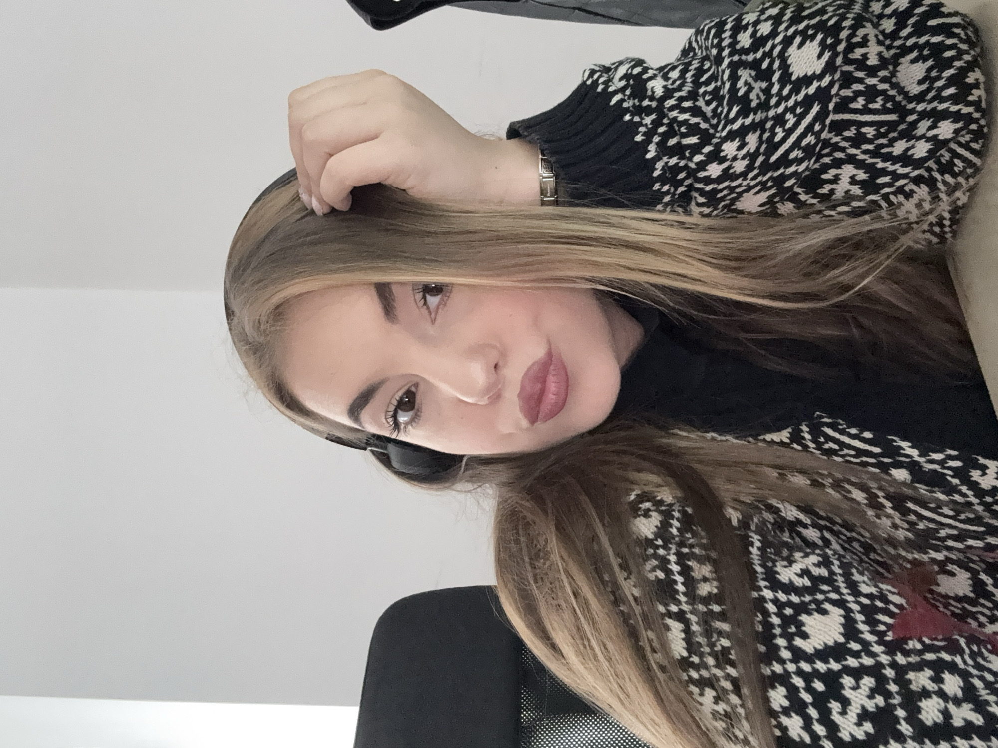 Office worker captured at dual-monitor desk setup in Sofia