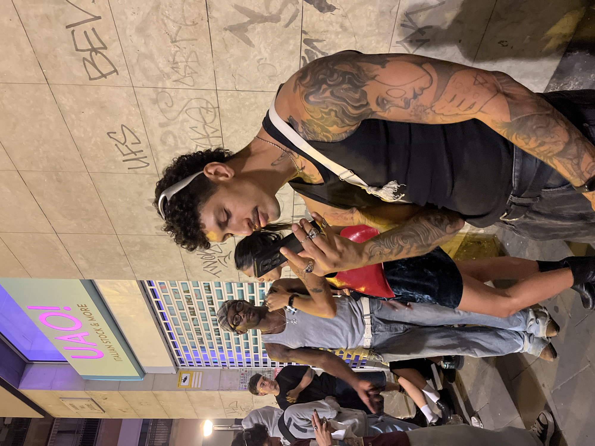 Evening street gatherings documented across Barcelona neighborhoods