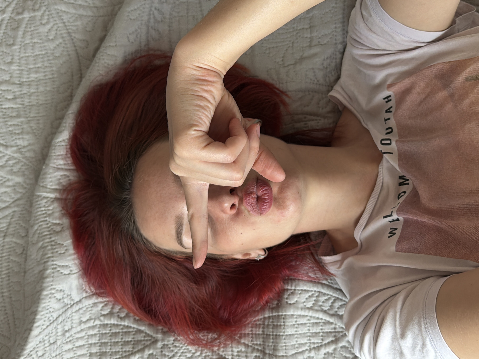 Woman takes morning selfies with cat in Chaikovsky home
