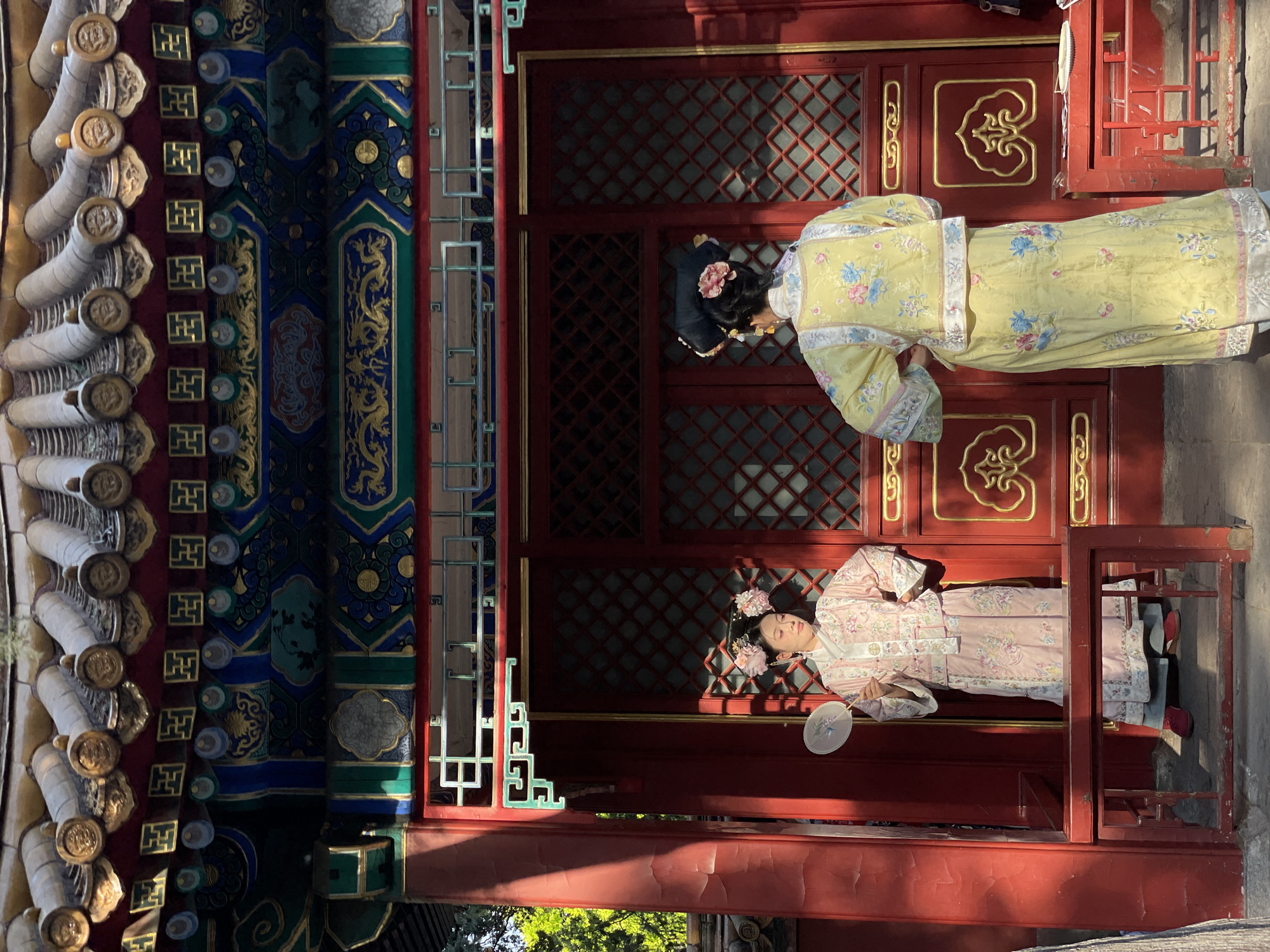 Women in traditional dress spotted at ornate Beijing building