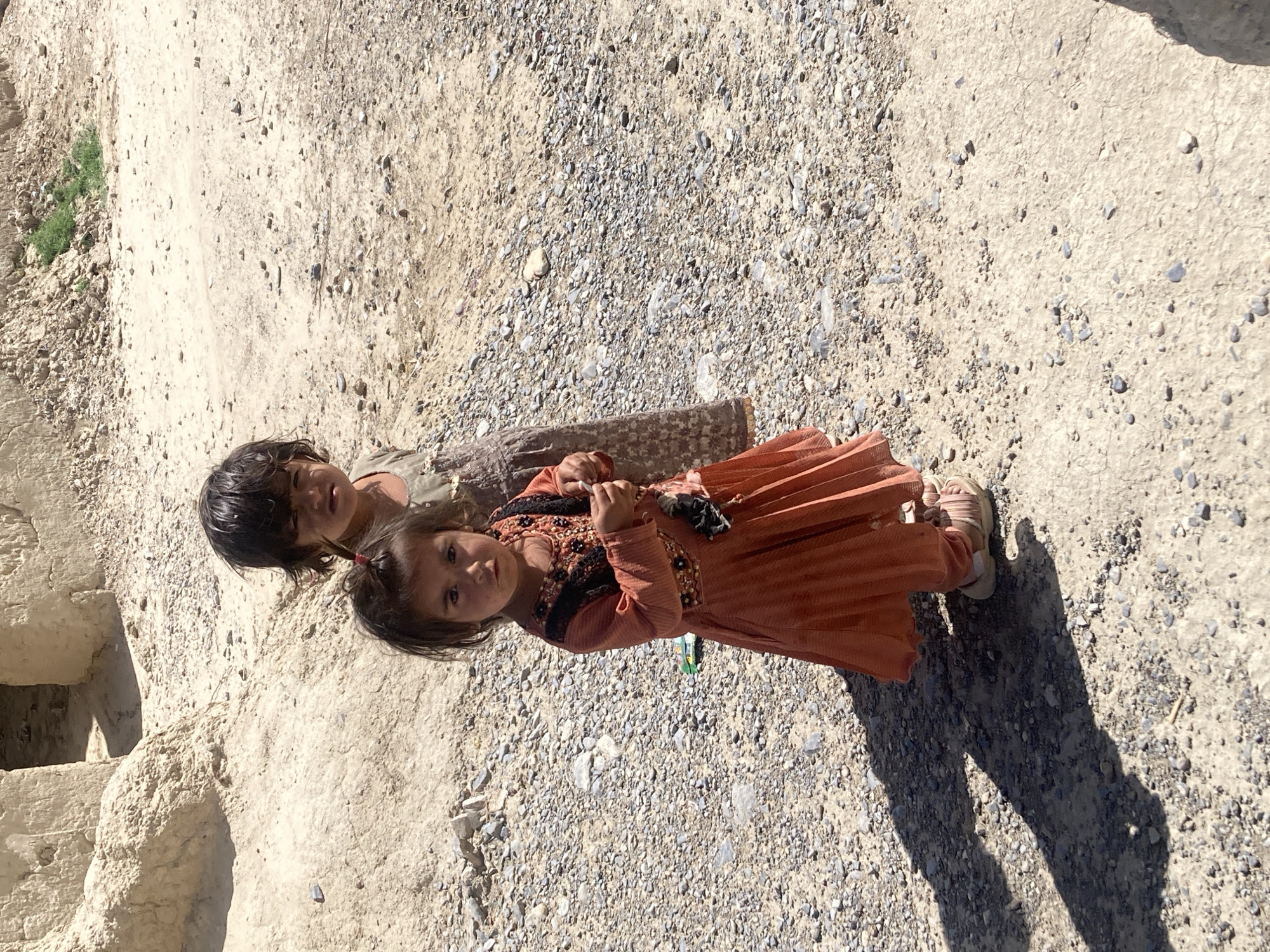 Two girls photographed in sunny Loralai, Pakistan
