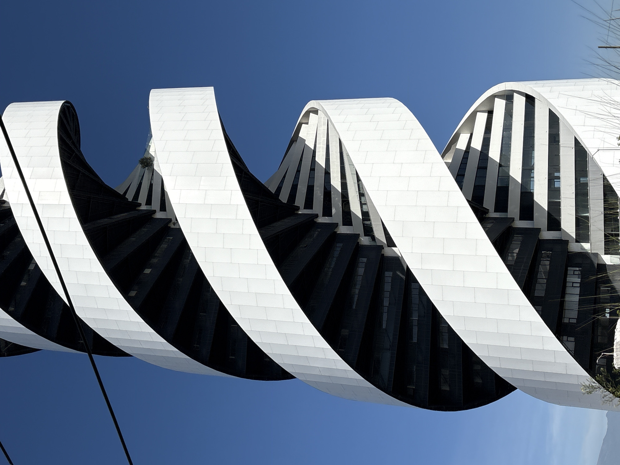 DNA helix-inspired skyscraper photographed in San Bernardino Tlaxcalancingo