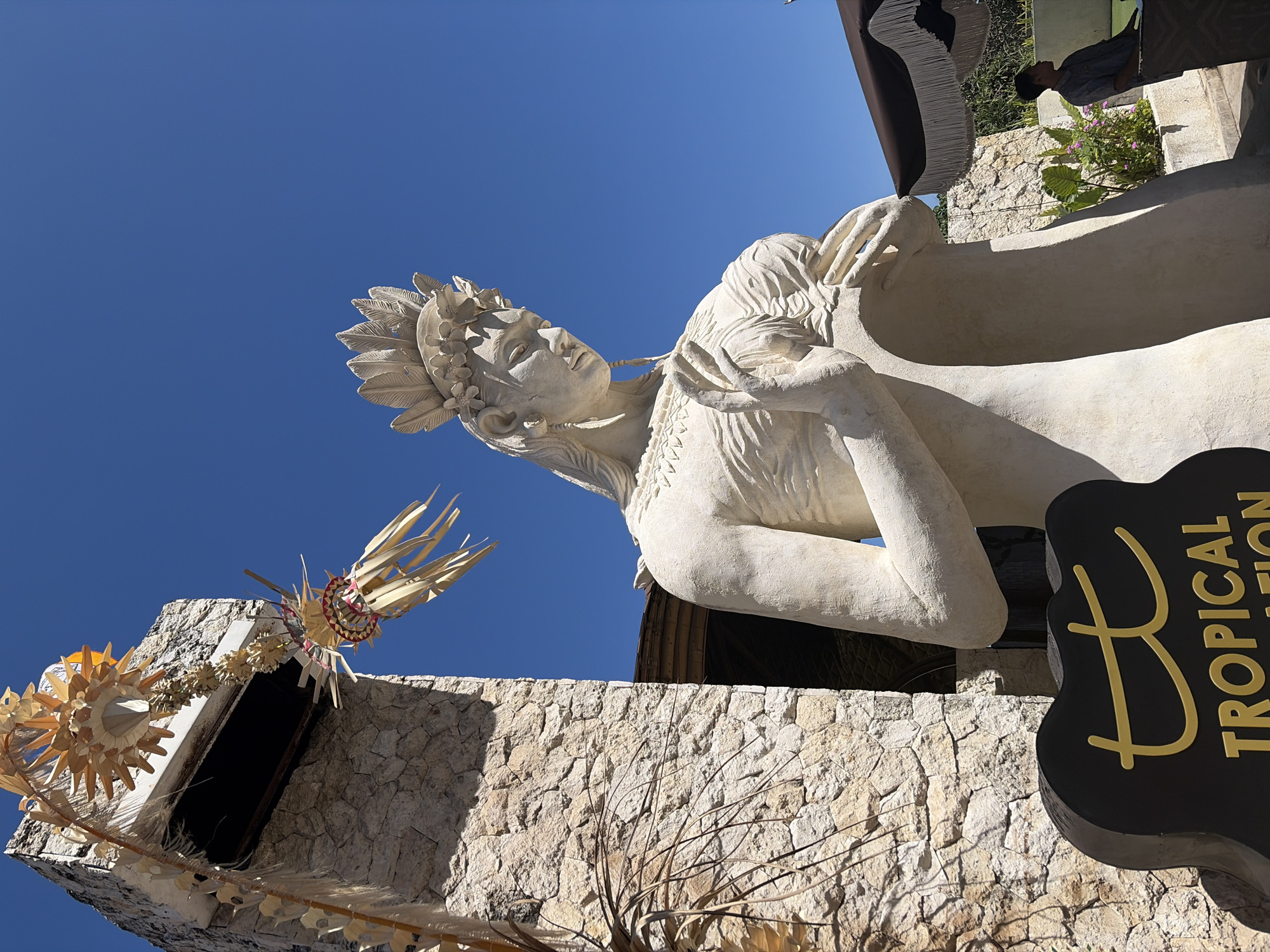 Cruising Kuta Selatan's cliff roads, temples, and stone statues
