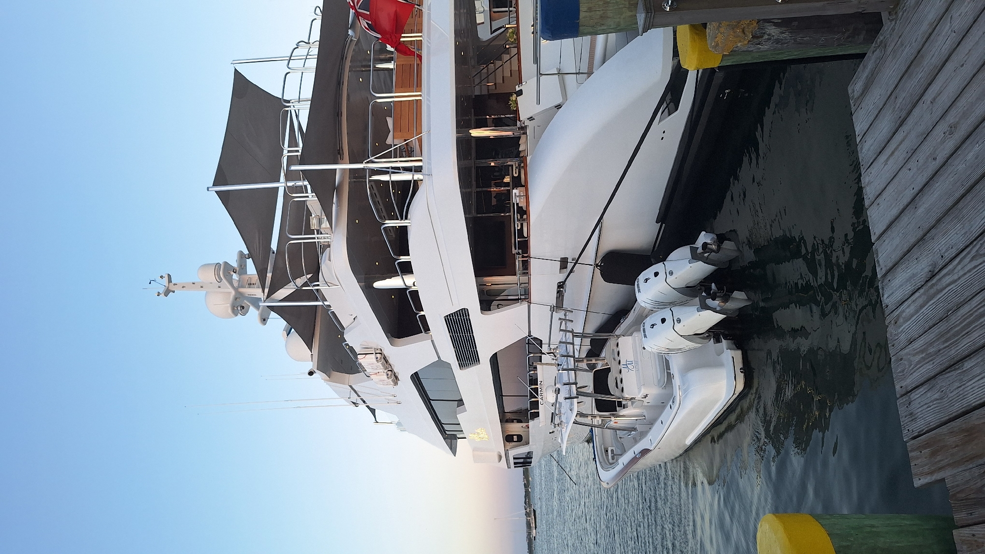 Nantucket harbor glows at sunset, boats at rest
