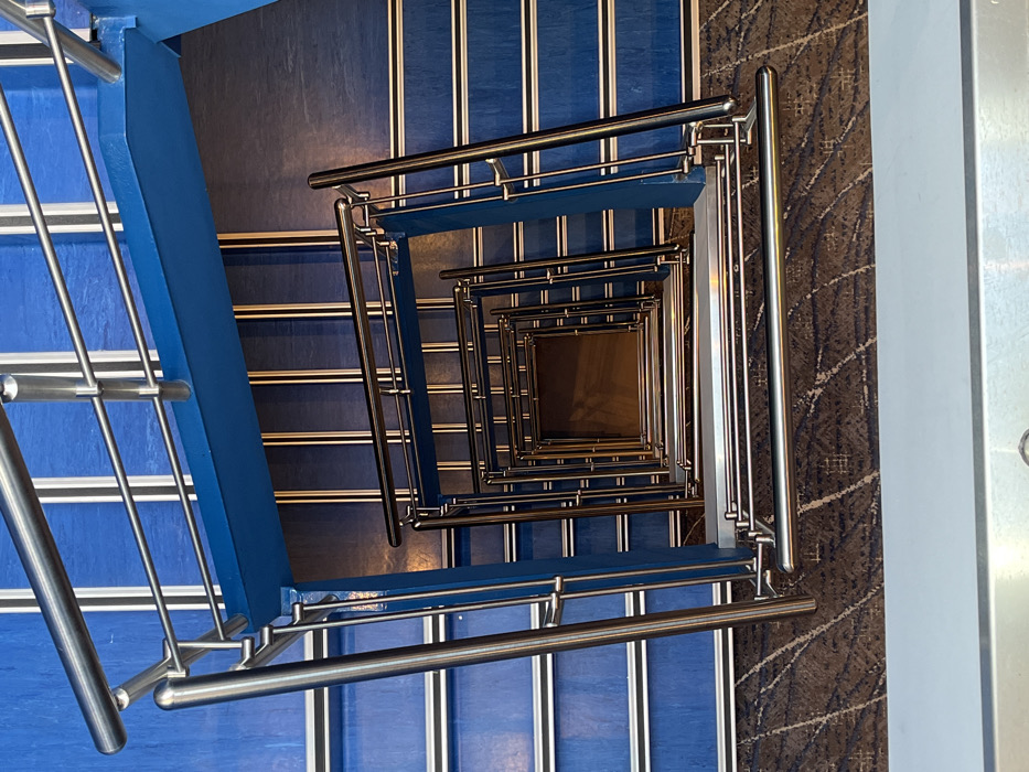 Blue spiral staircase photographed from above in Argentina