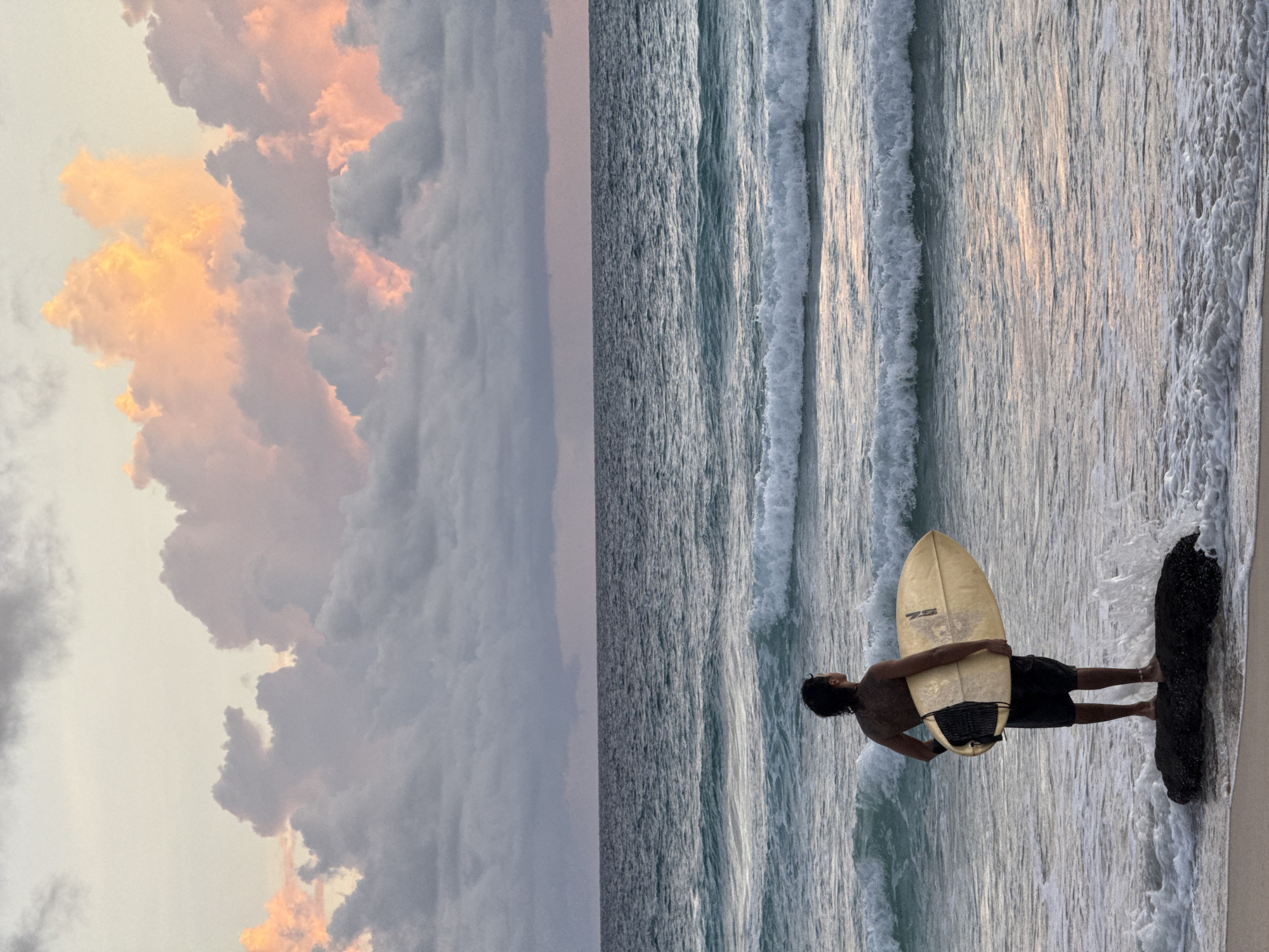 Surfer and sunset at Karon Beach, Phuket