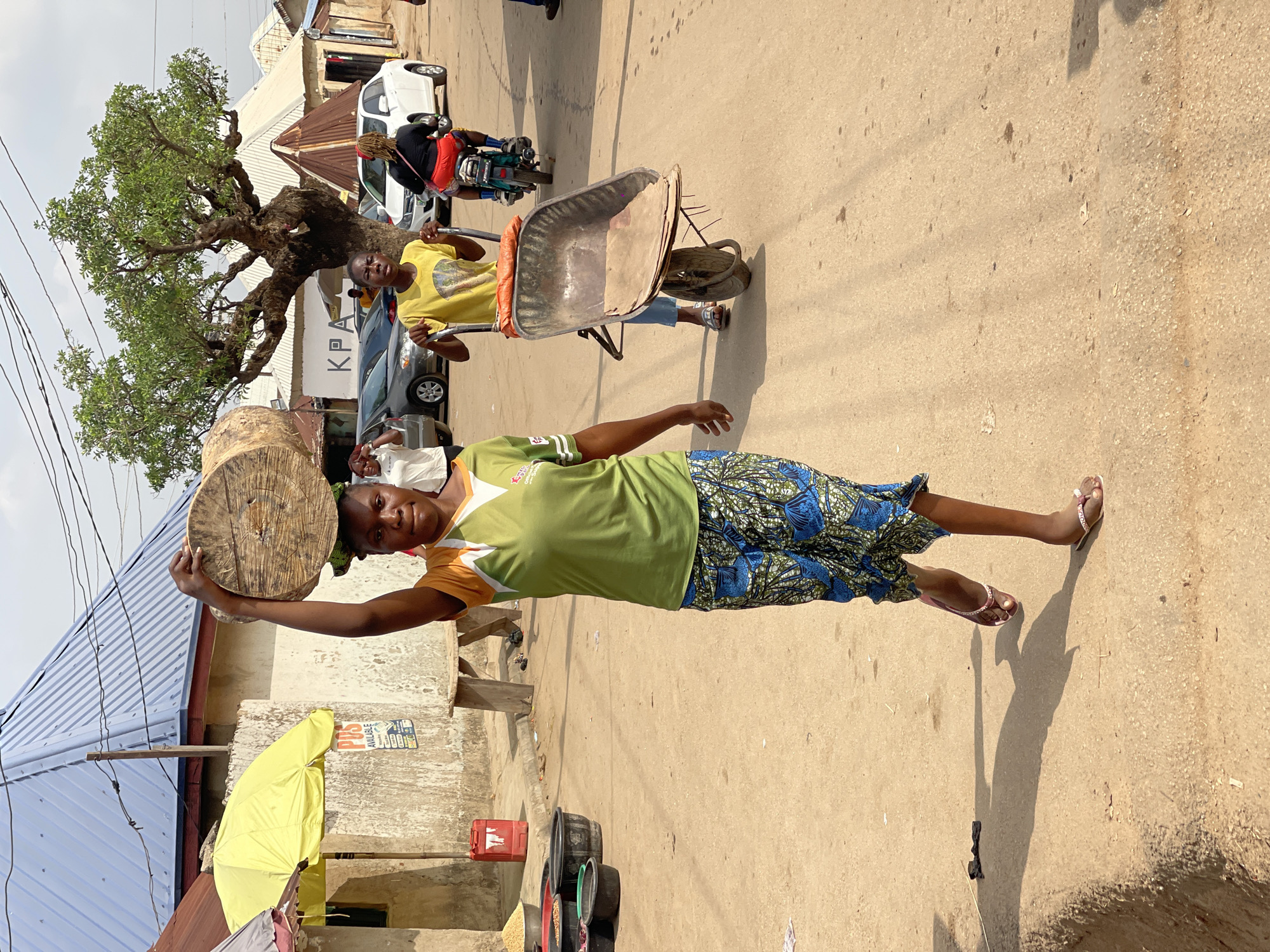 Morning street life documented in Kuchingoro, Nigeria