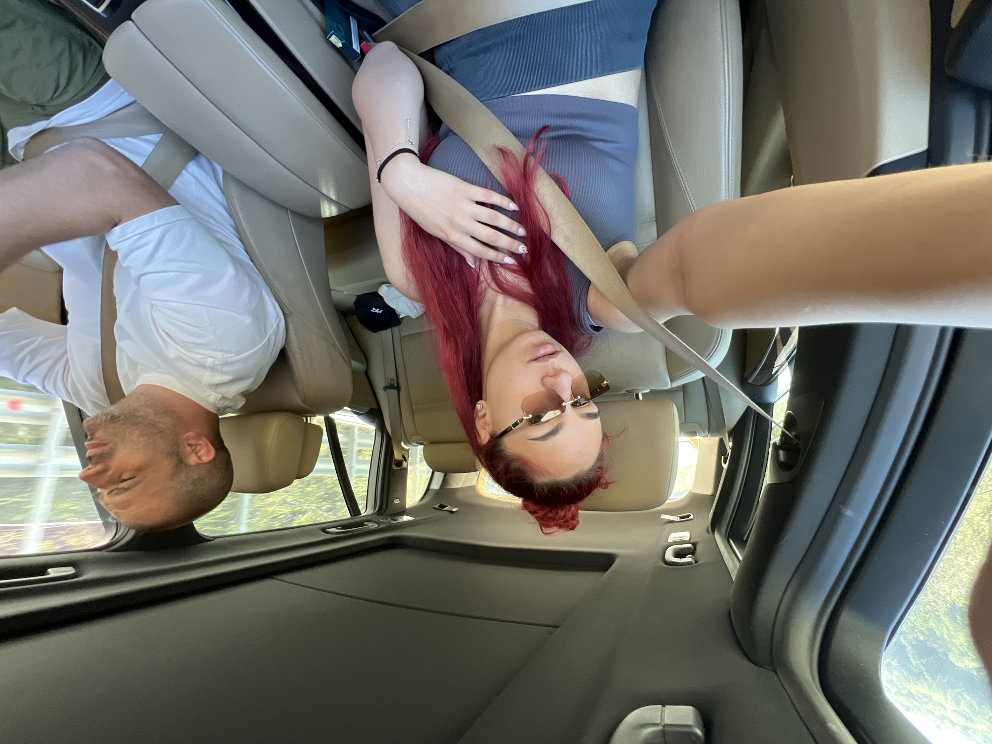 Car passengers document sunny morning drive through Bulgarian village