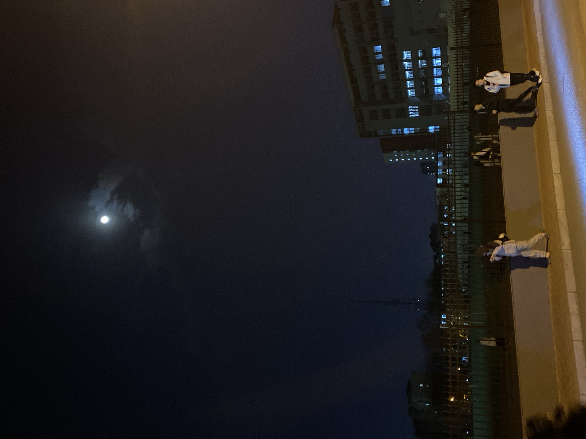 Nighttime street activity captured in Zhongtun, China