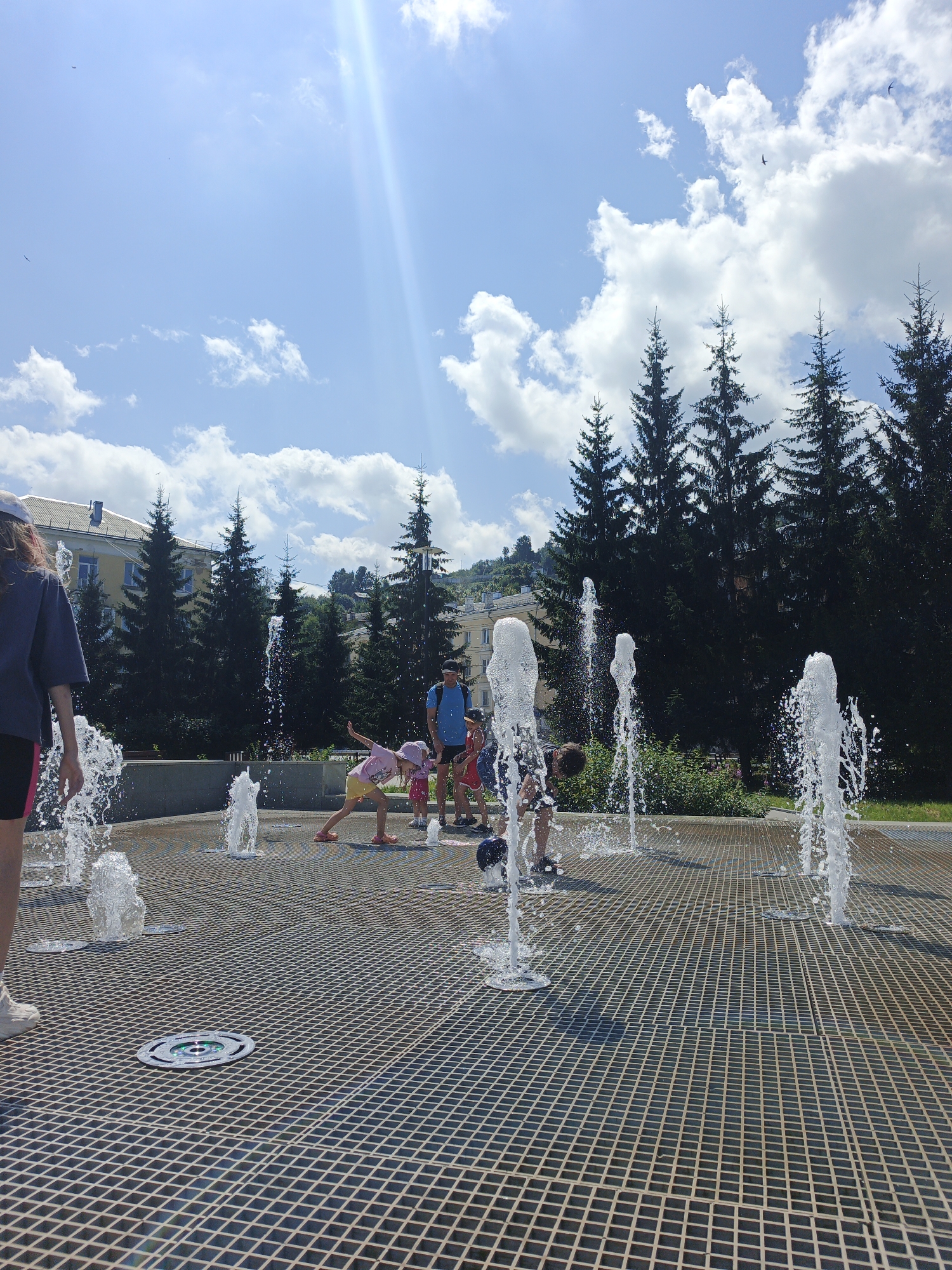 Summer day at Zlatoust's splash pad and civic center