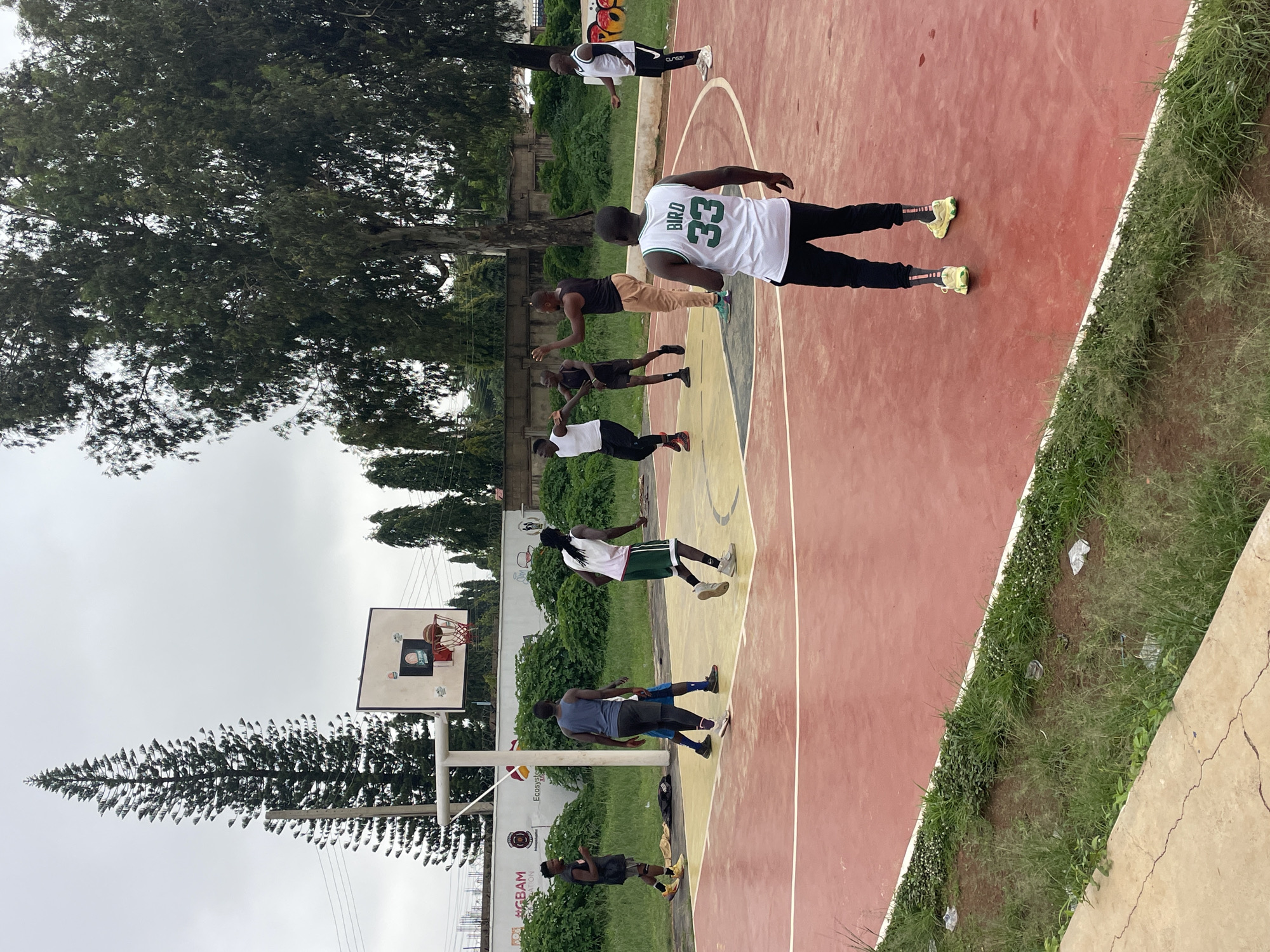 Morning street life and basketball game documented in Nigerian communities
