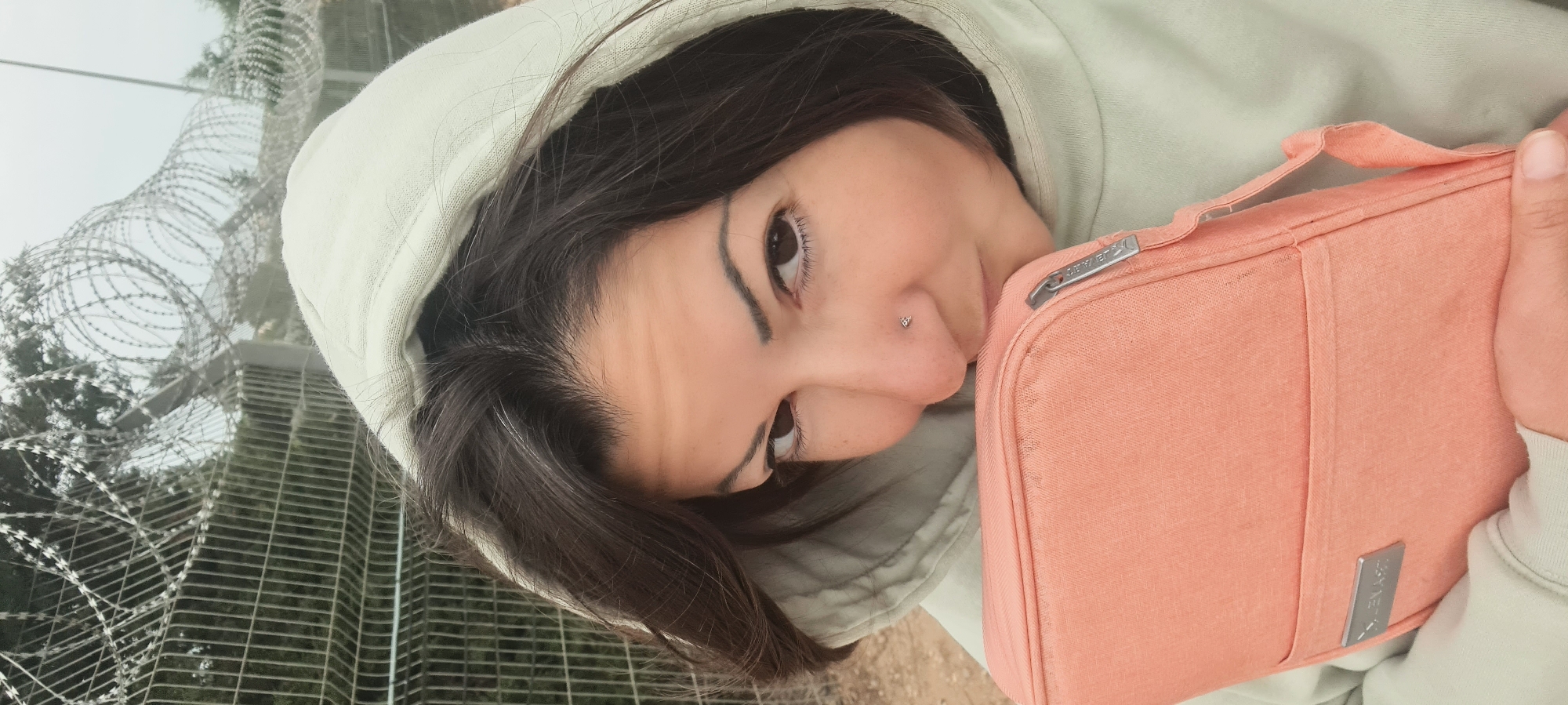 Woman with bag observed near security fence in Lachish