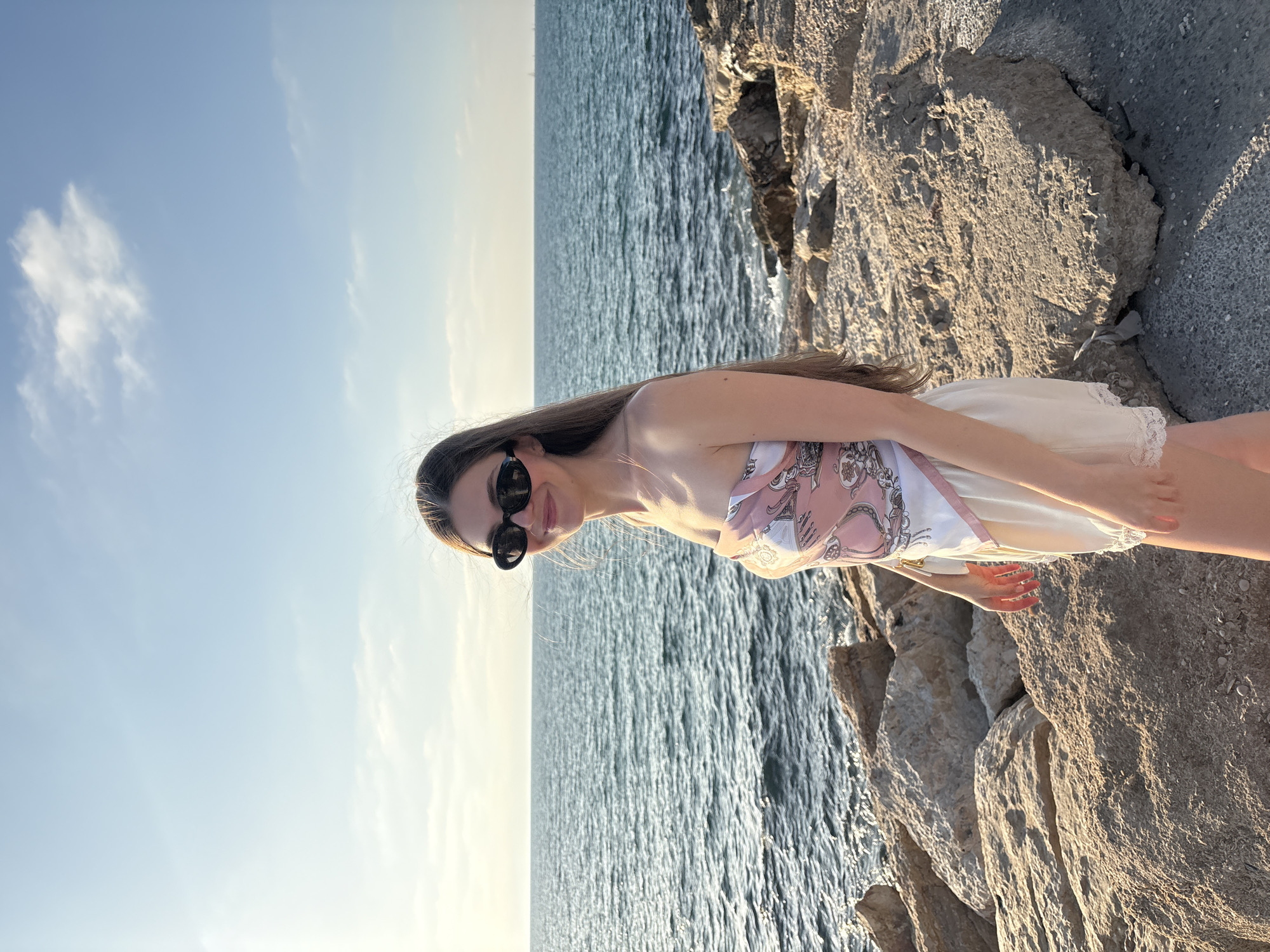 Friends pose for photos along Tel Aviv Mediterranean coastline