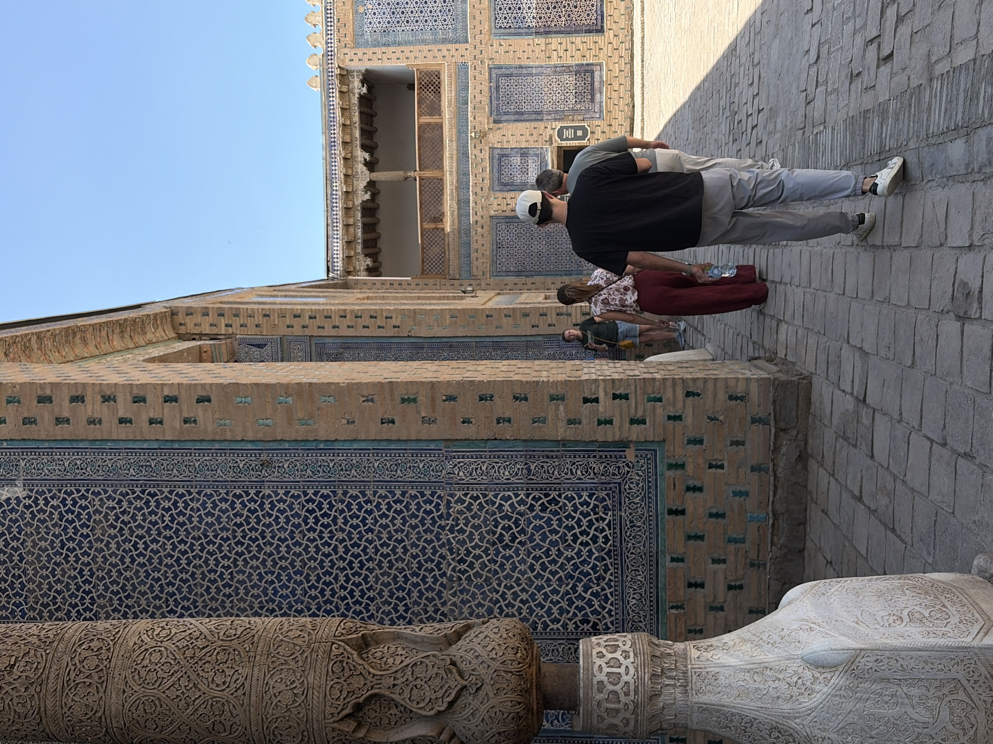 Morning tourism captured at Uzbekistan's historic Khiva complex