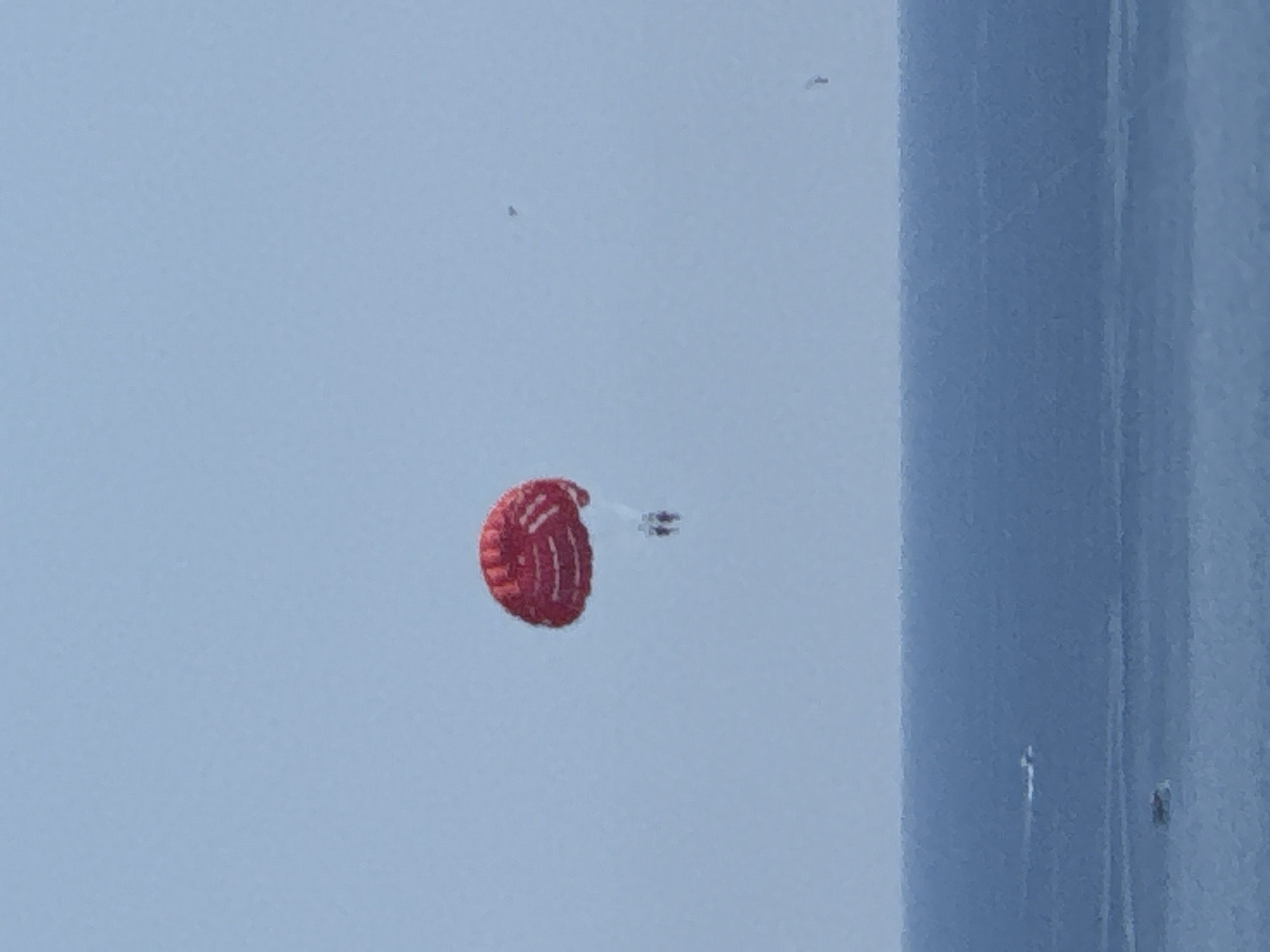 Paragliders and parasailers over the Montenegrin coast