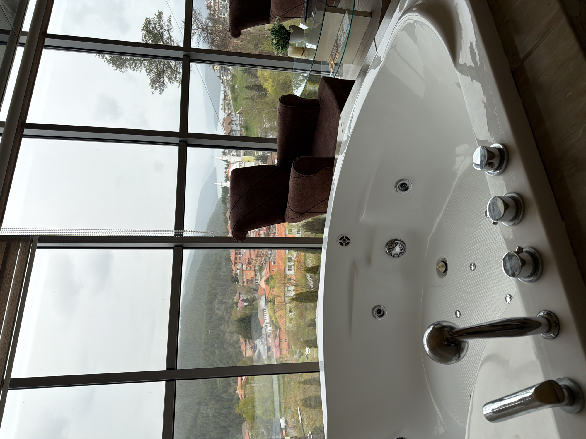 Witness captures bathroom interior and wet mountain road scenes