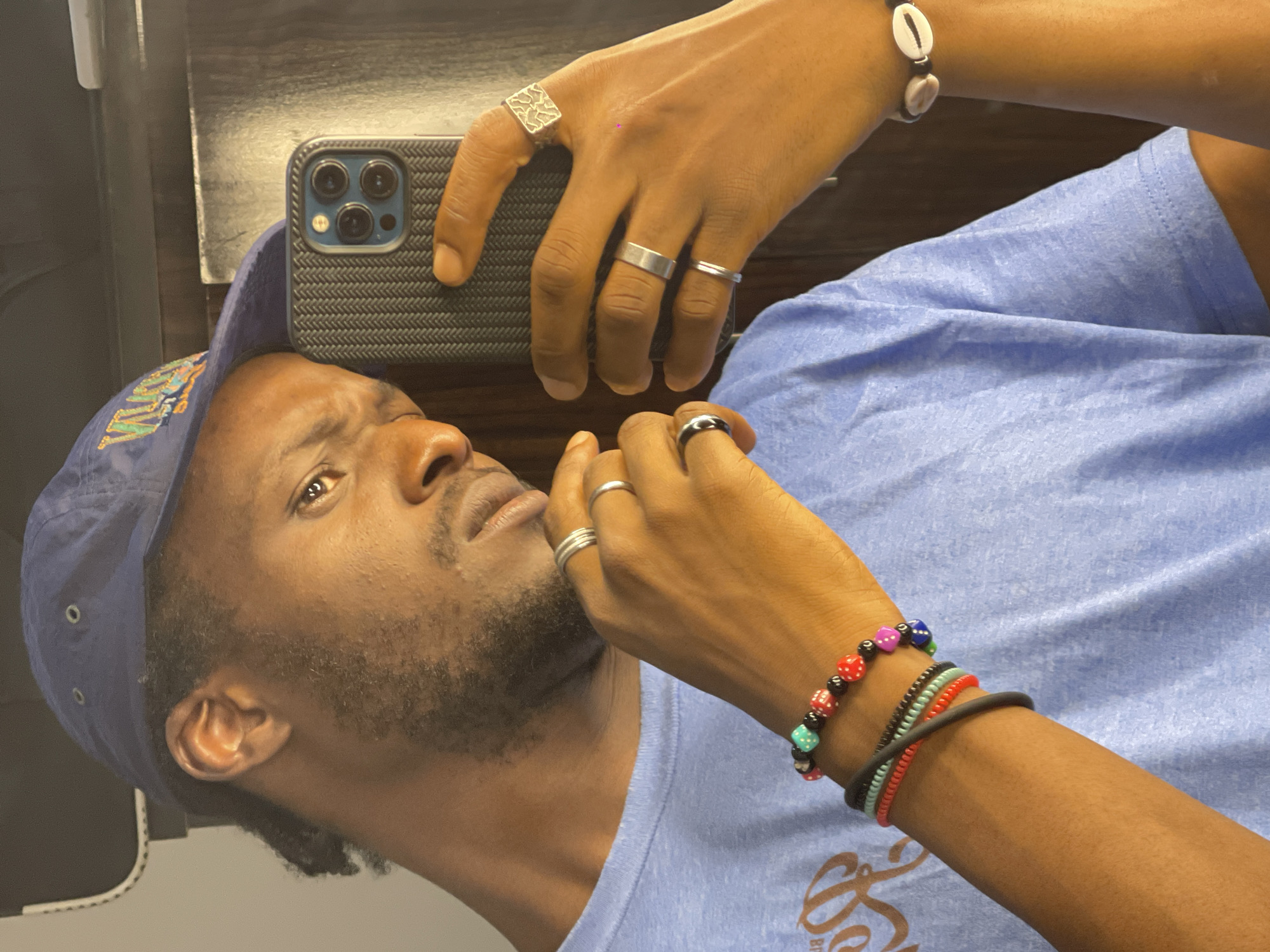 Mirror selfies and blue ink portrait sketches in Abuja
