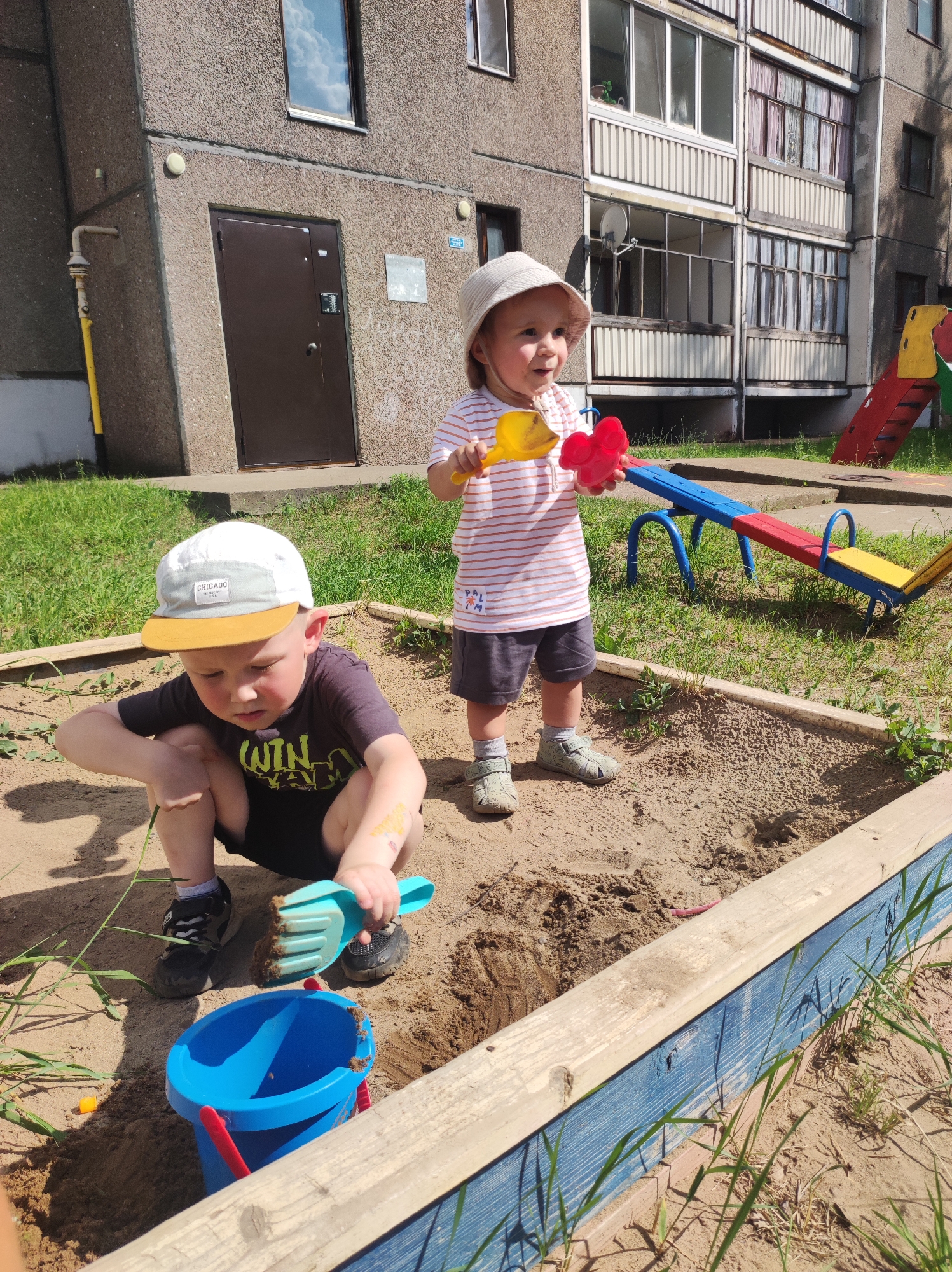 Mother and child enjoy playground time in Markovsky, Russia
