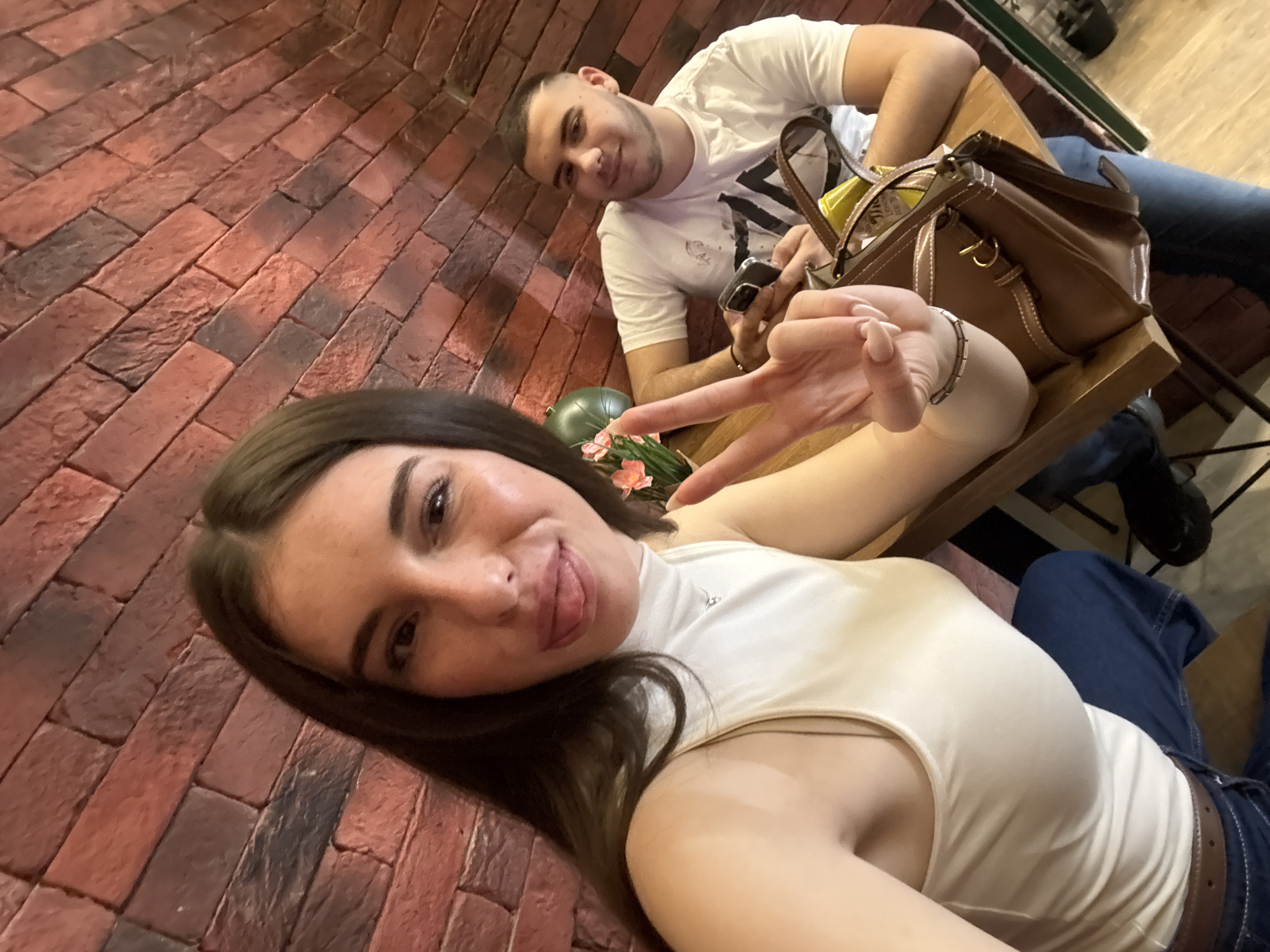 Two people sitting at table in Sofia indoor setting