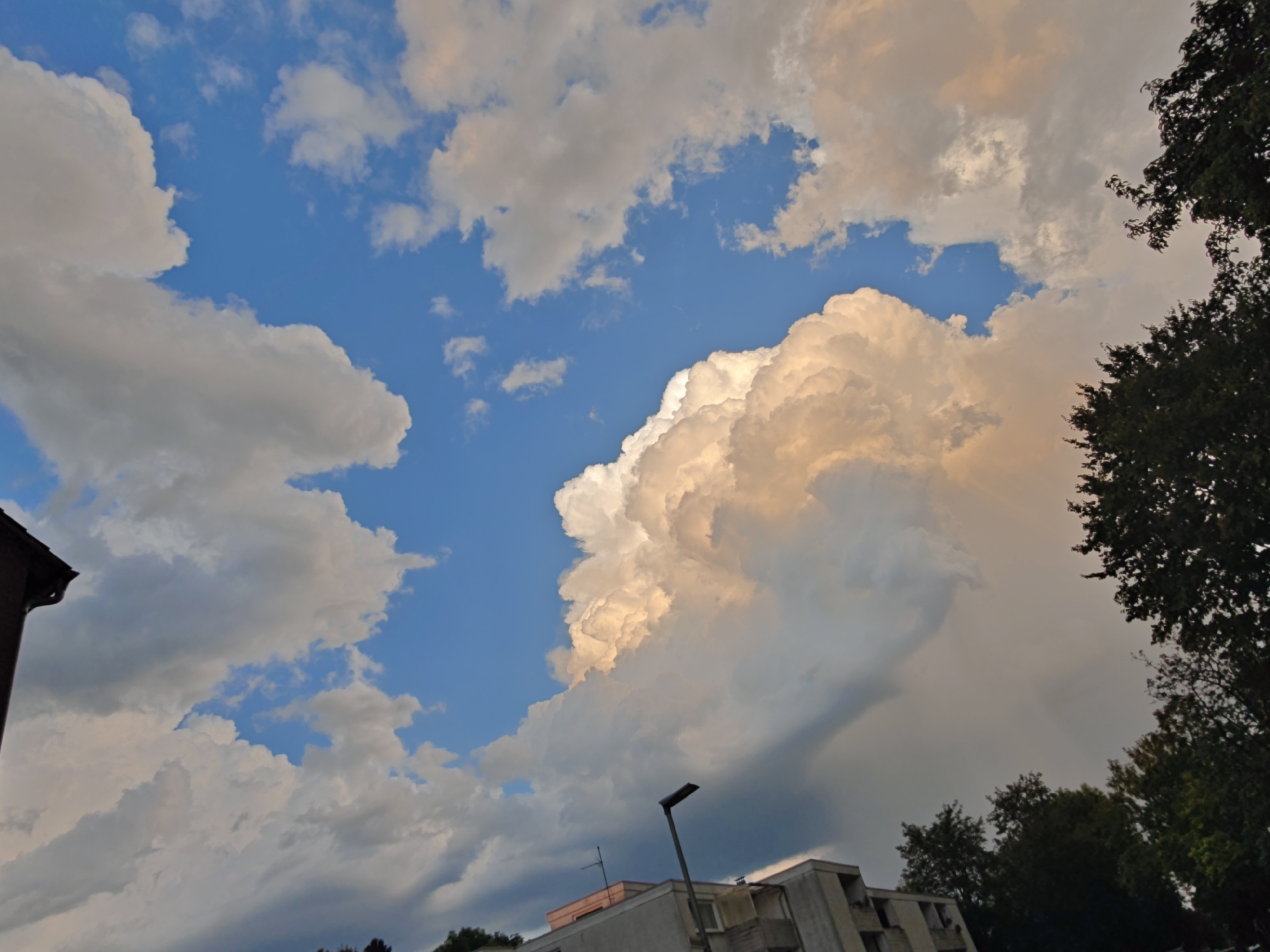 Golden summer clouds at dusk over Georgsmarienhütte