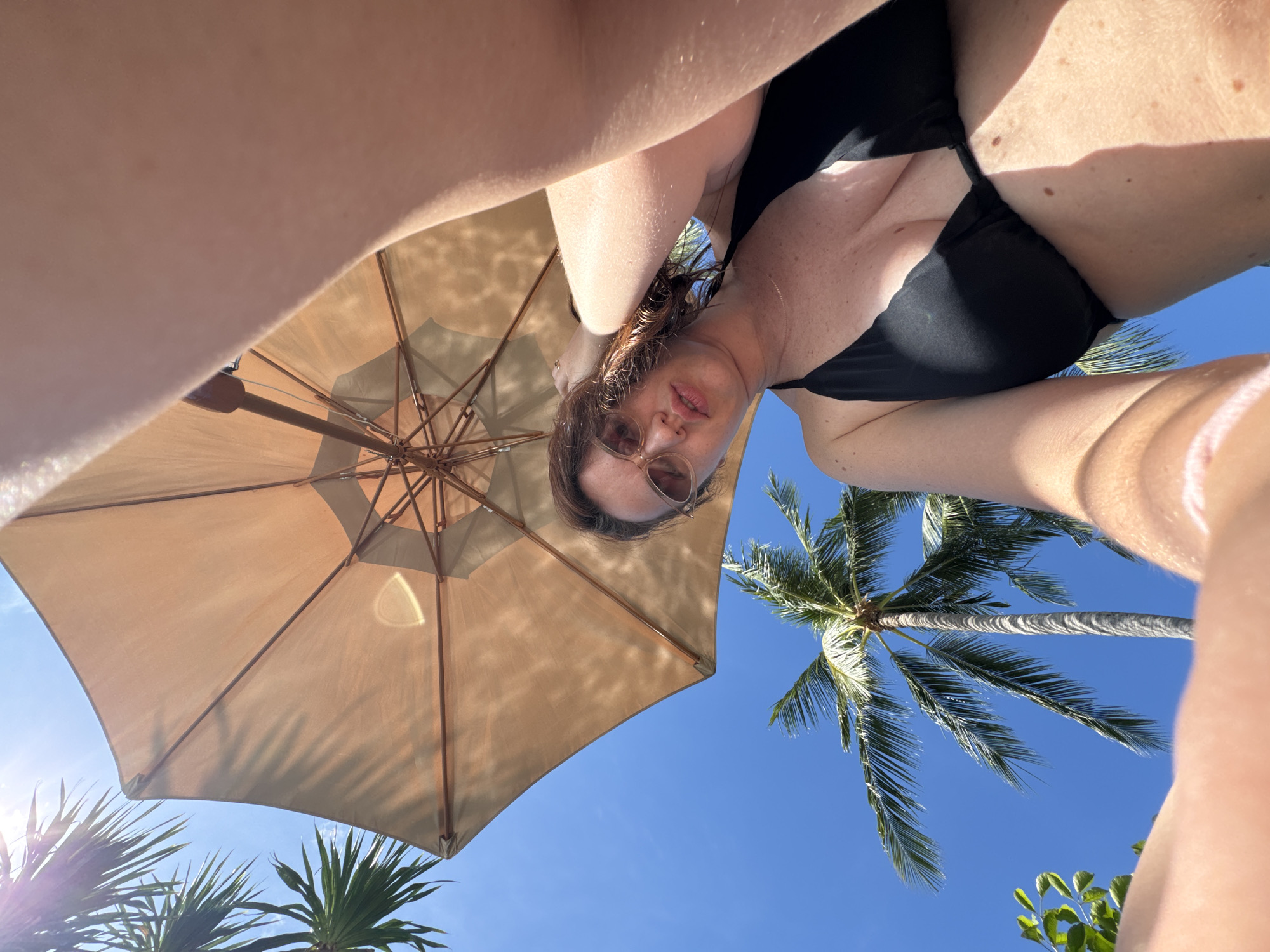 Poolside morning at a beachfront resort in Baan Plai Laem
